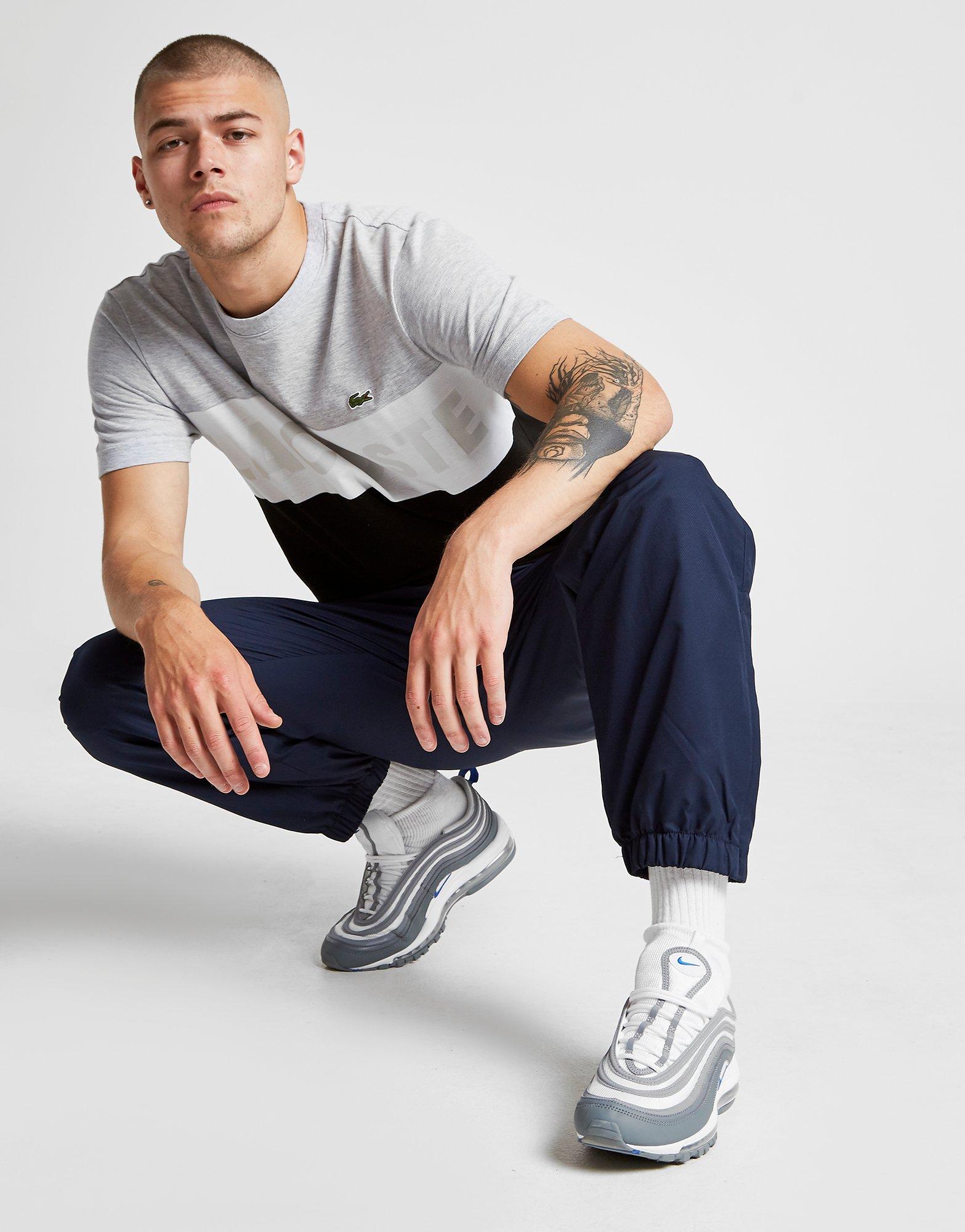 white lacoste guppy pants