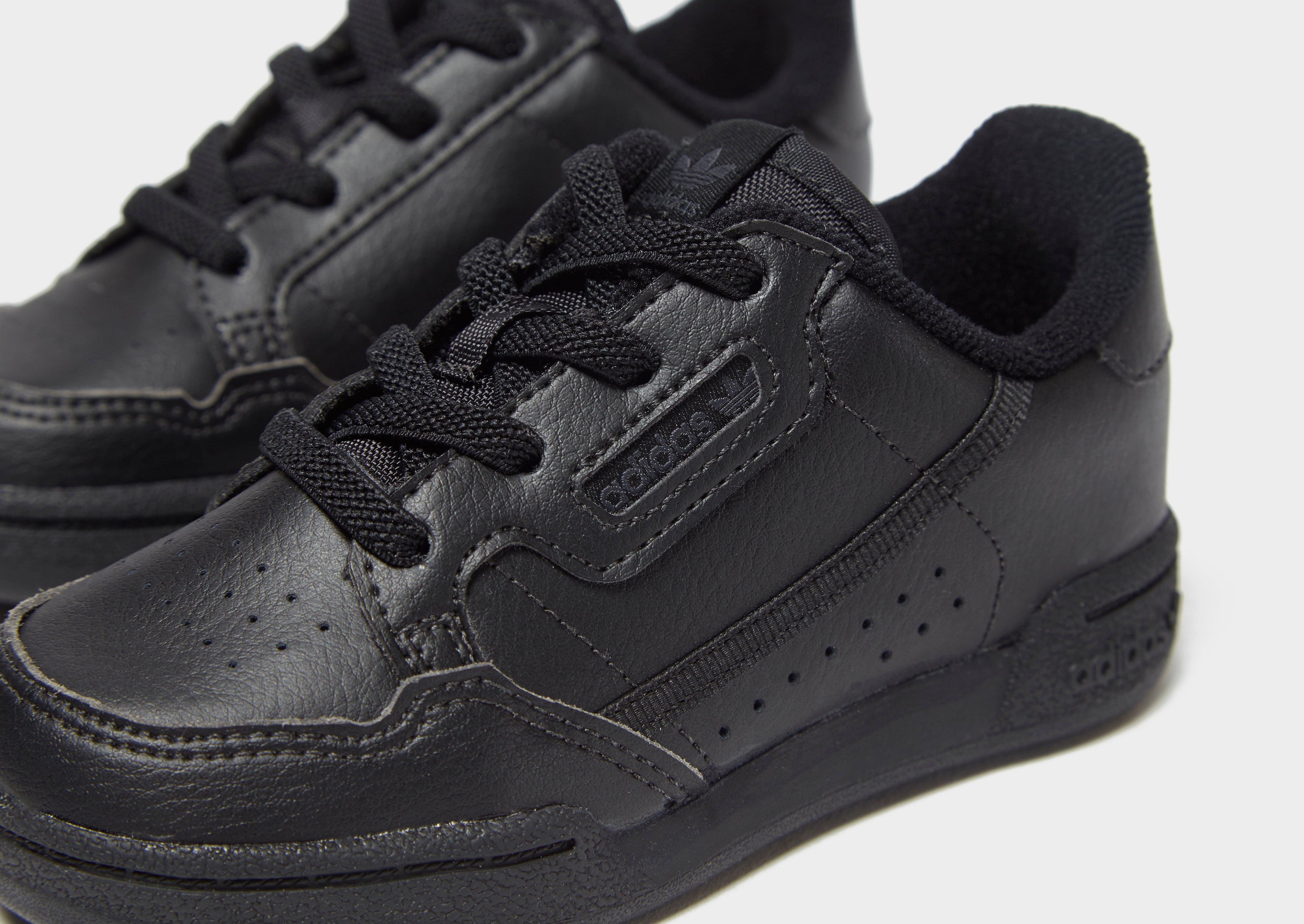 all black adidas continental 80