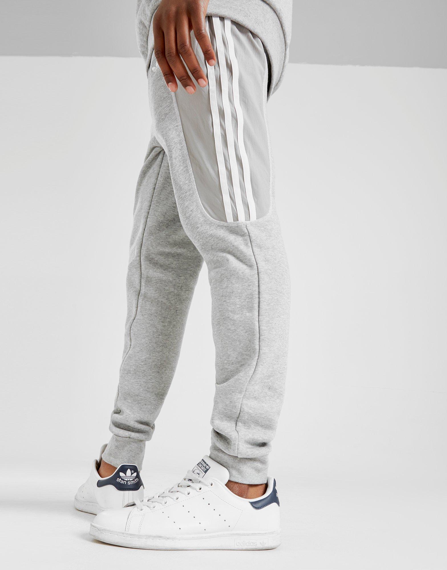 blue adidas track pants womens