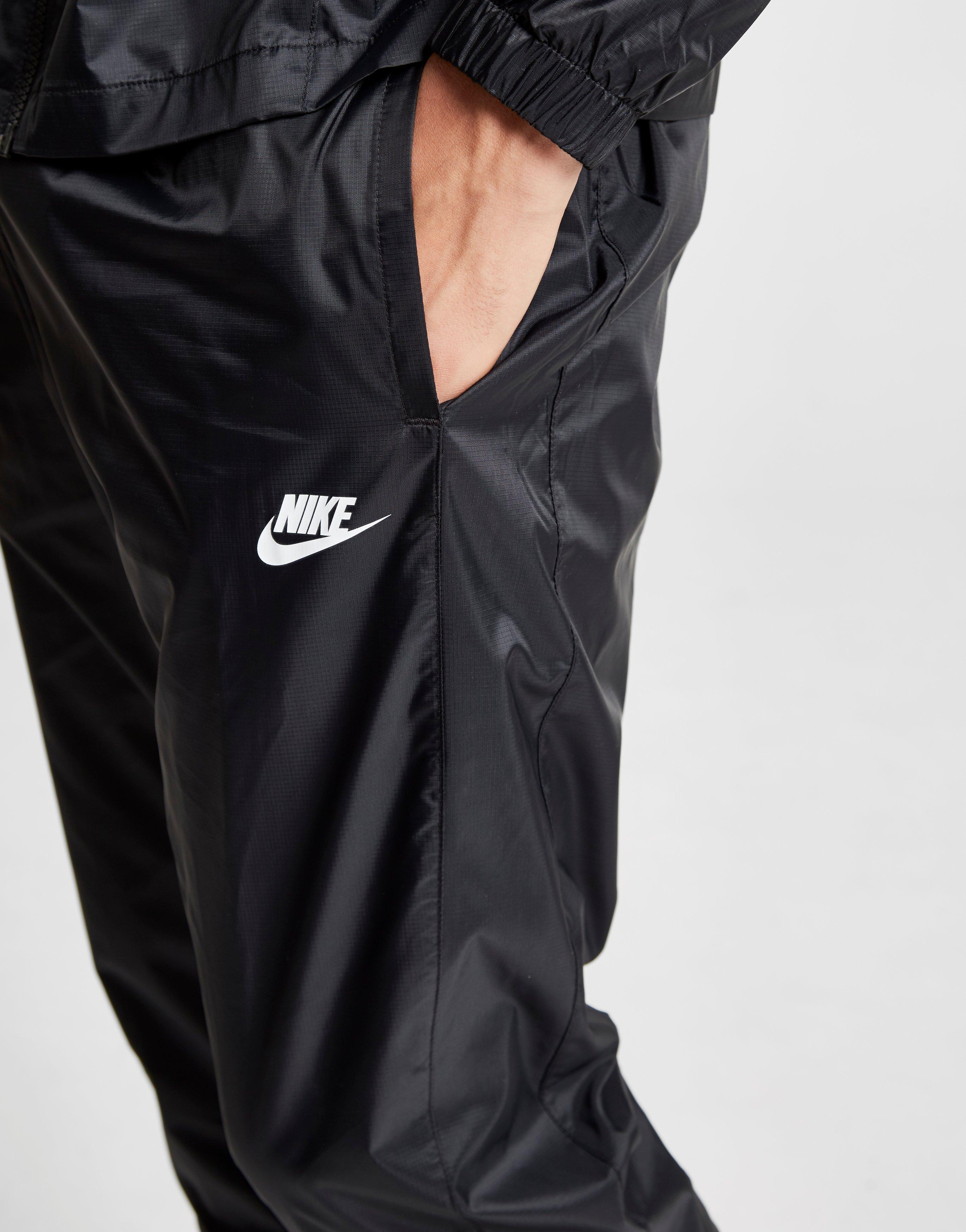 nike shut out track pants