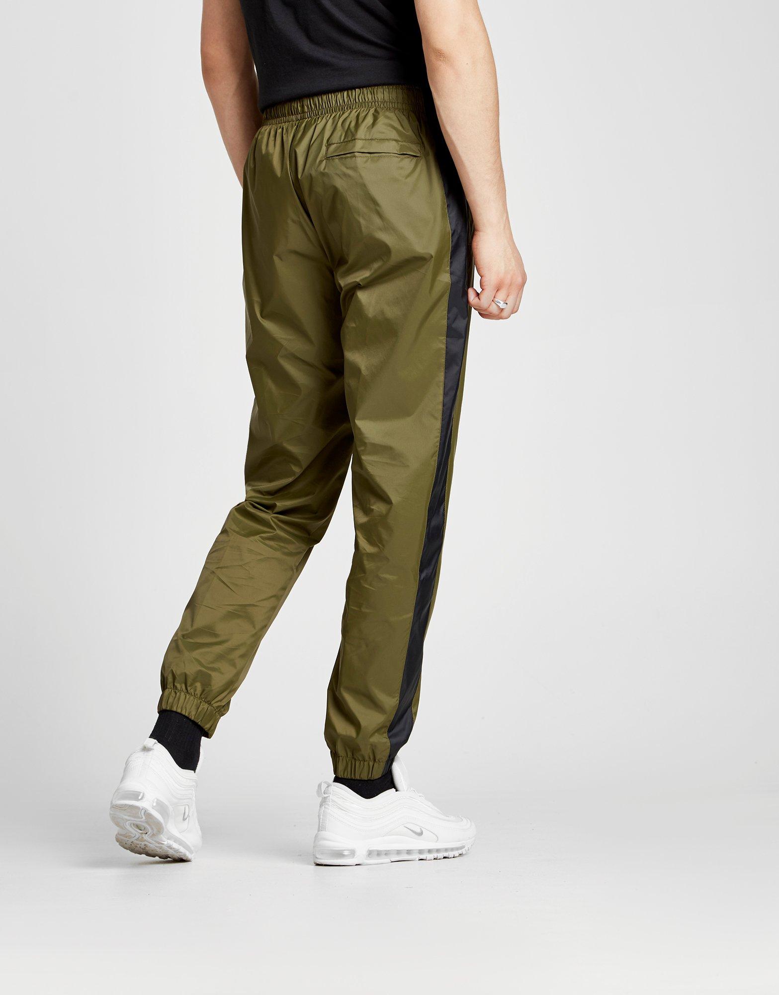 nike shut out track pants