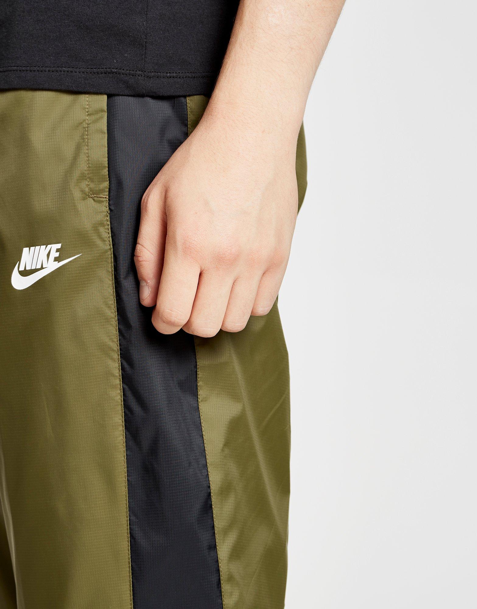 nike shut out track pants