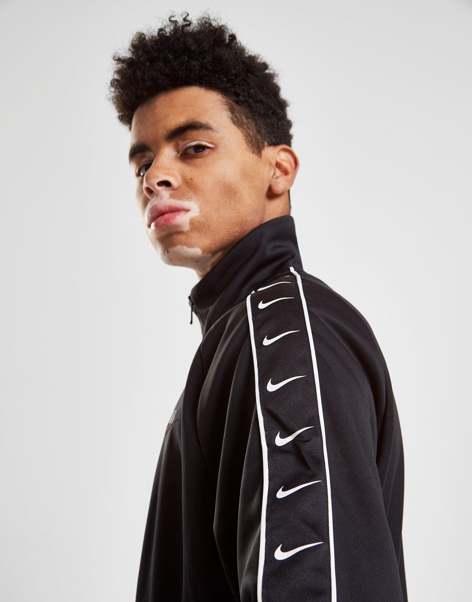 nike taped poly track jacket