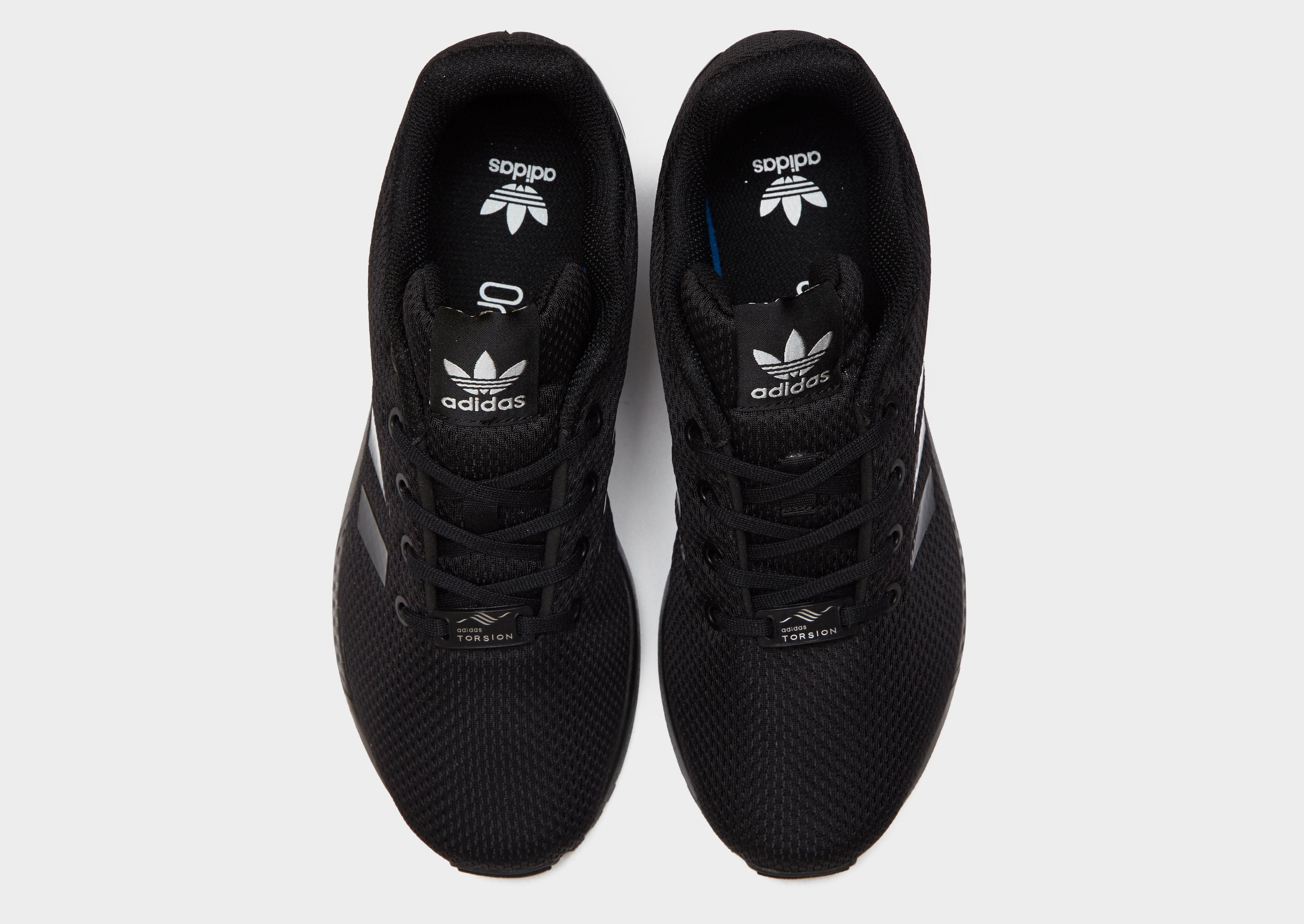 black adidas flux junior