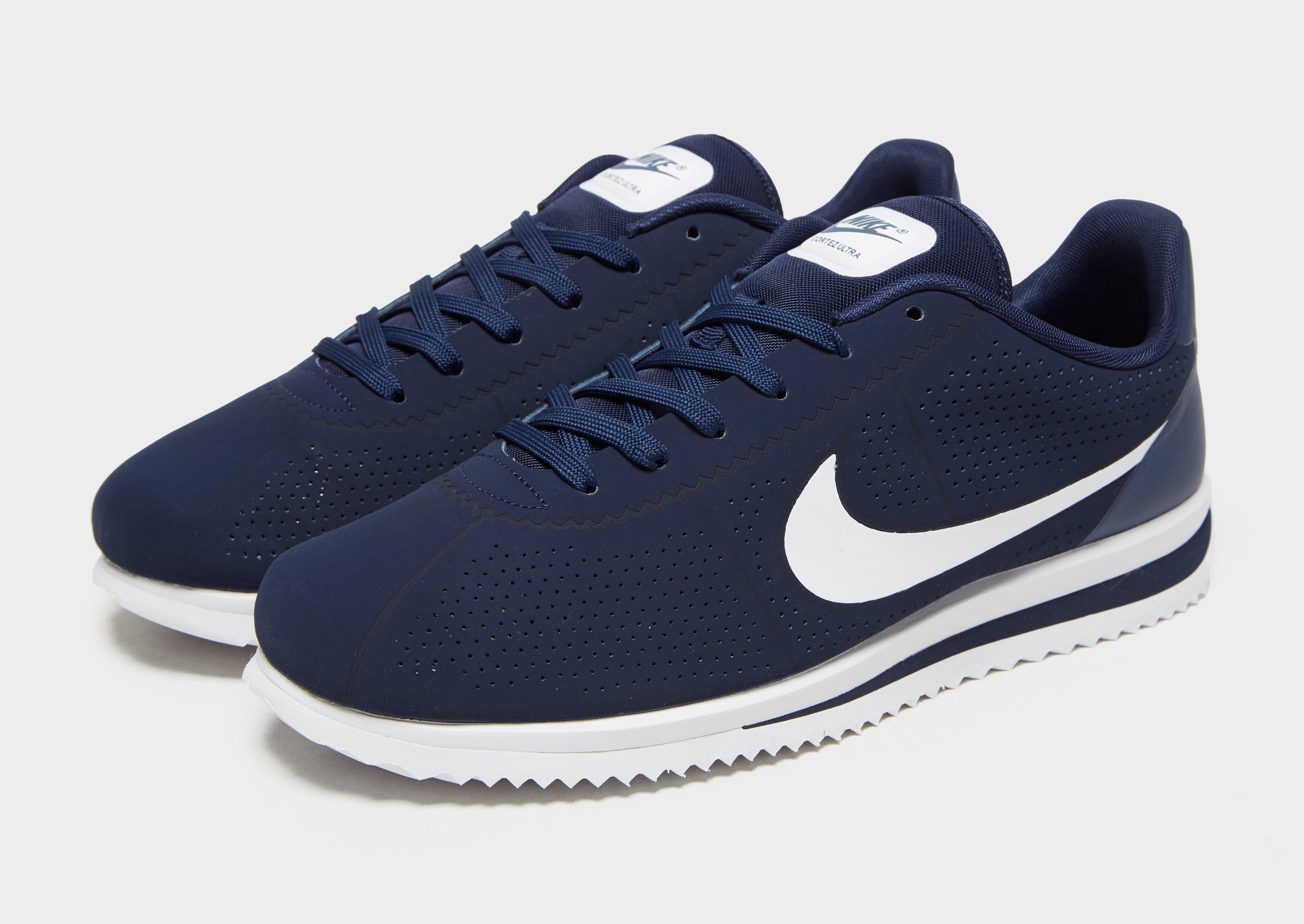 nike cortez ultra moire trainers in perforated black and white