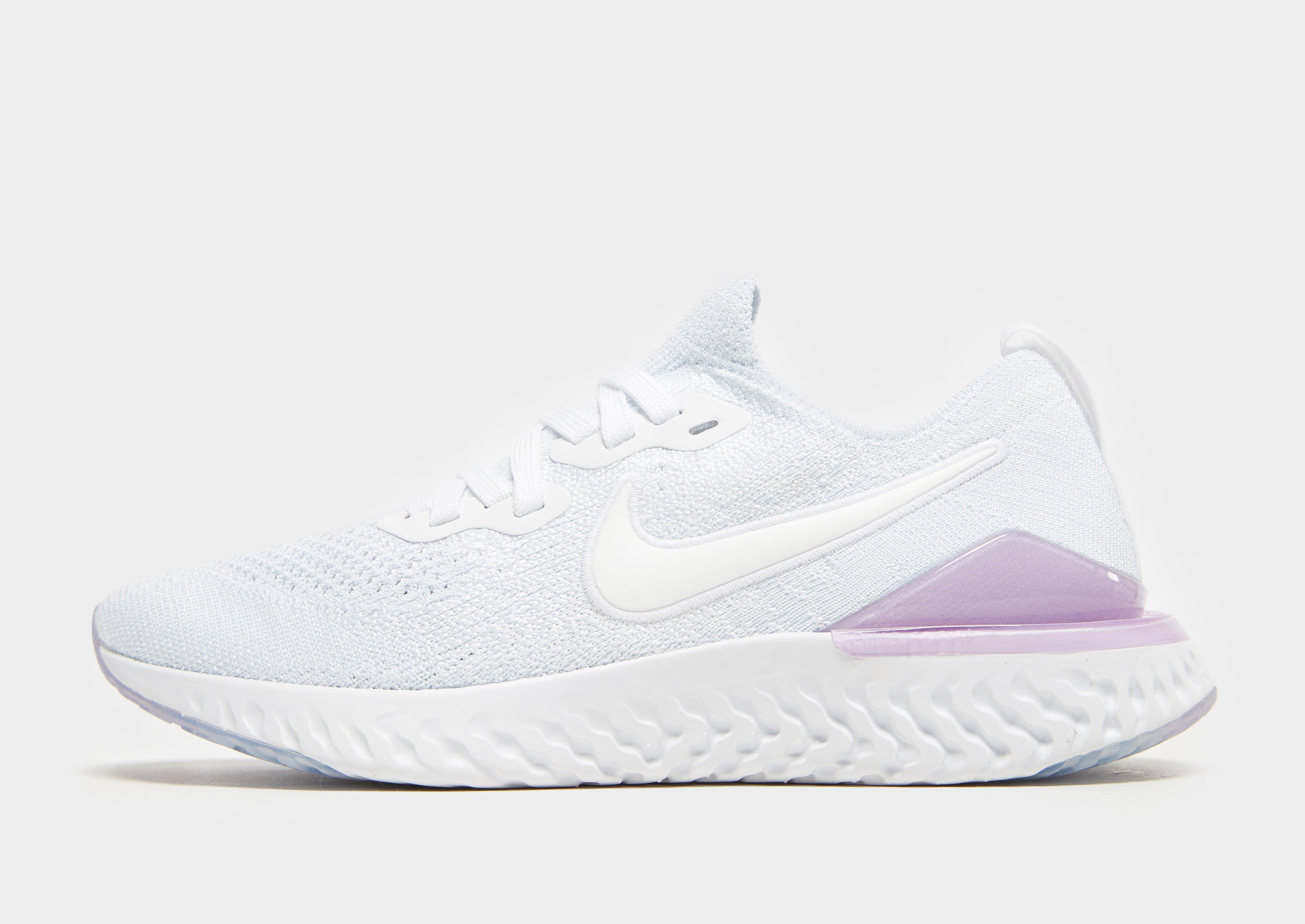 nike running epic react trainers in white and pink