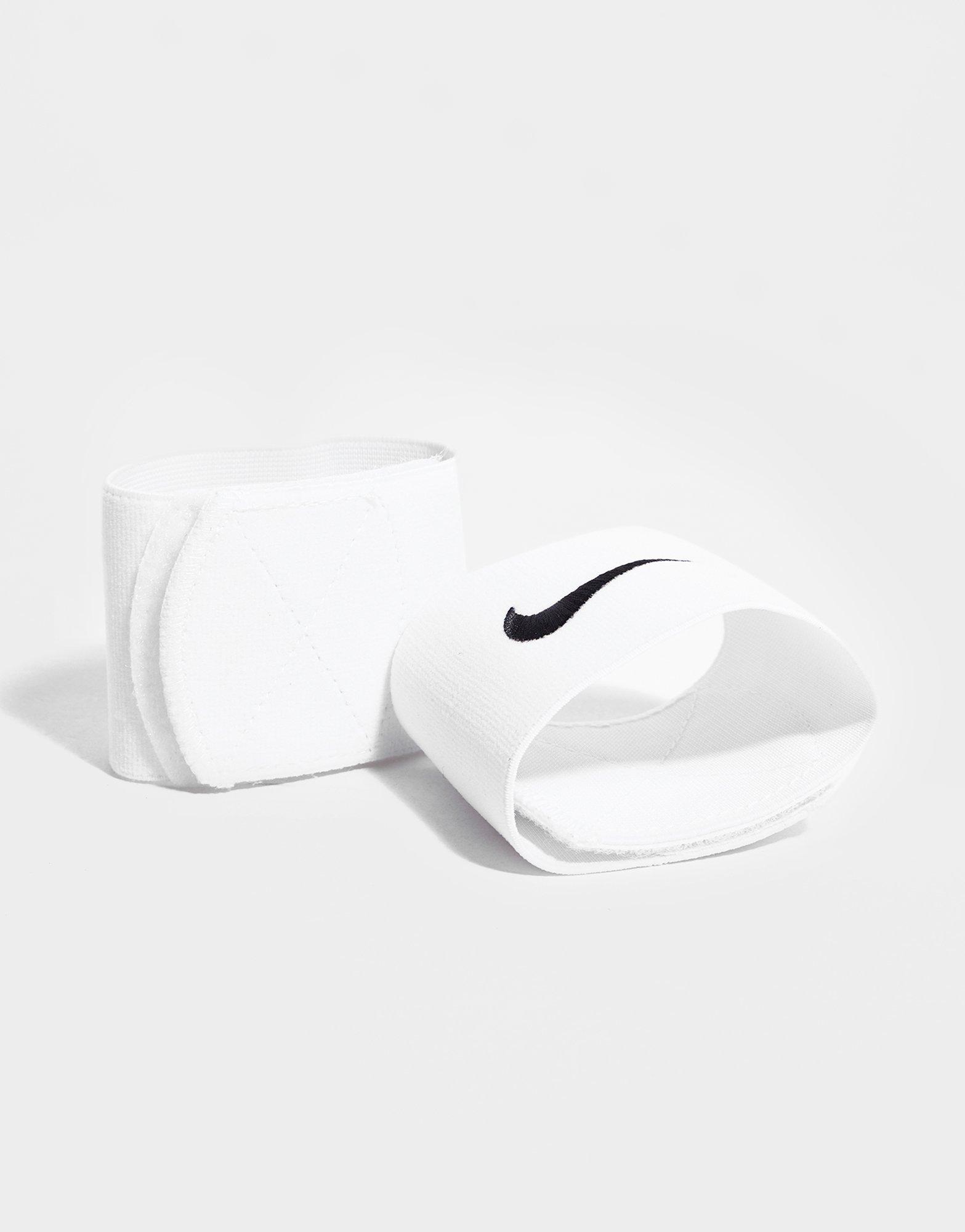 Cinta sujeta espinilleras Nike velcro marino