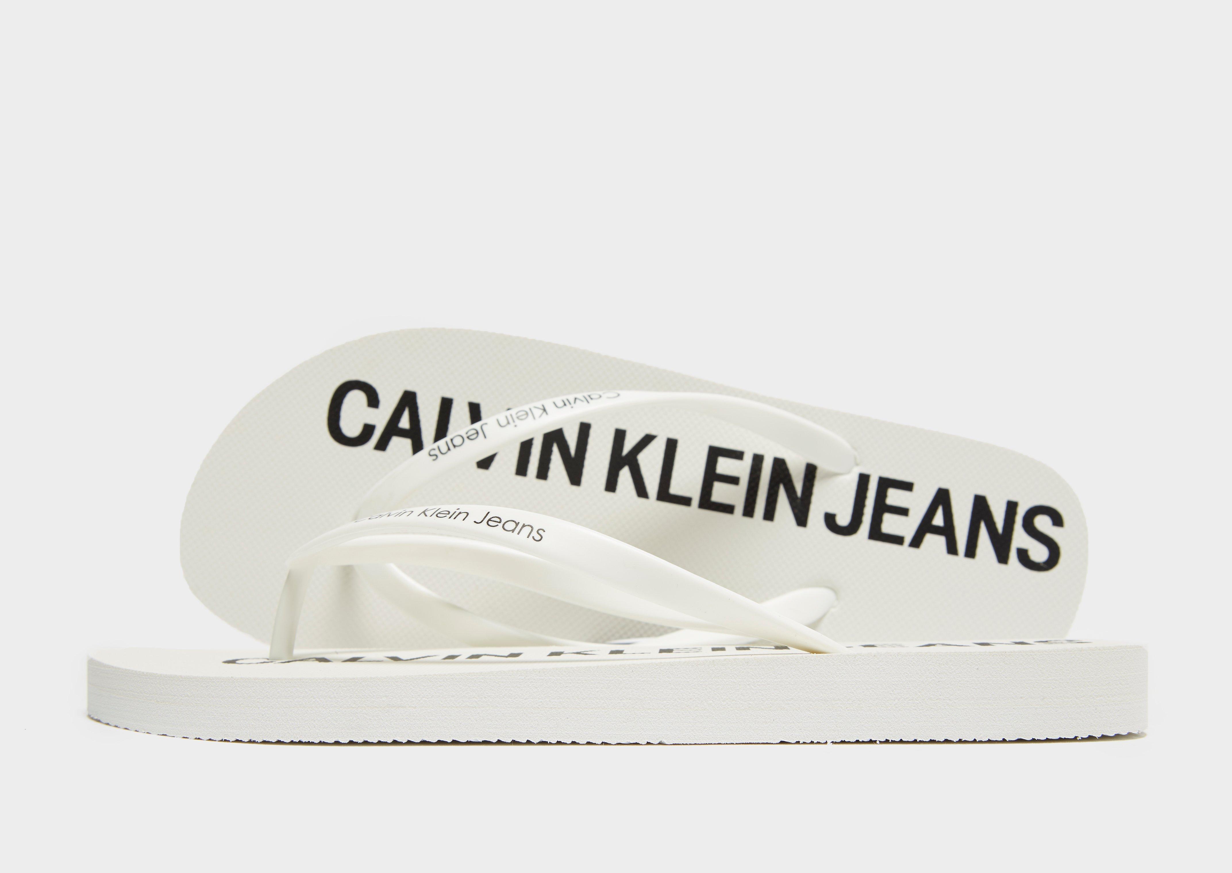 calvin klein white flip flops