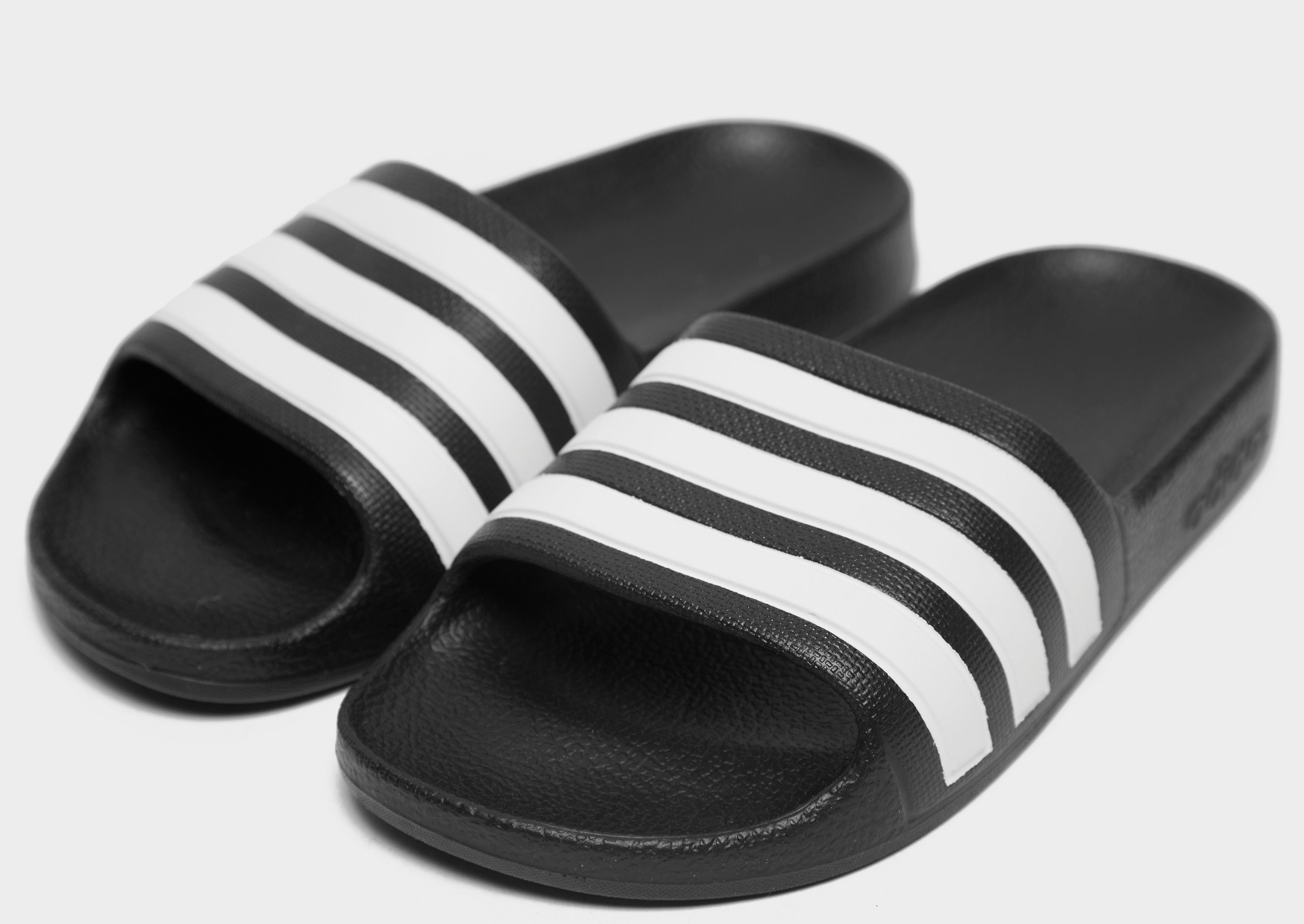 adidas flip flops barn