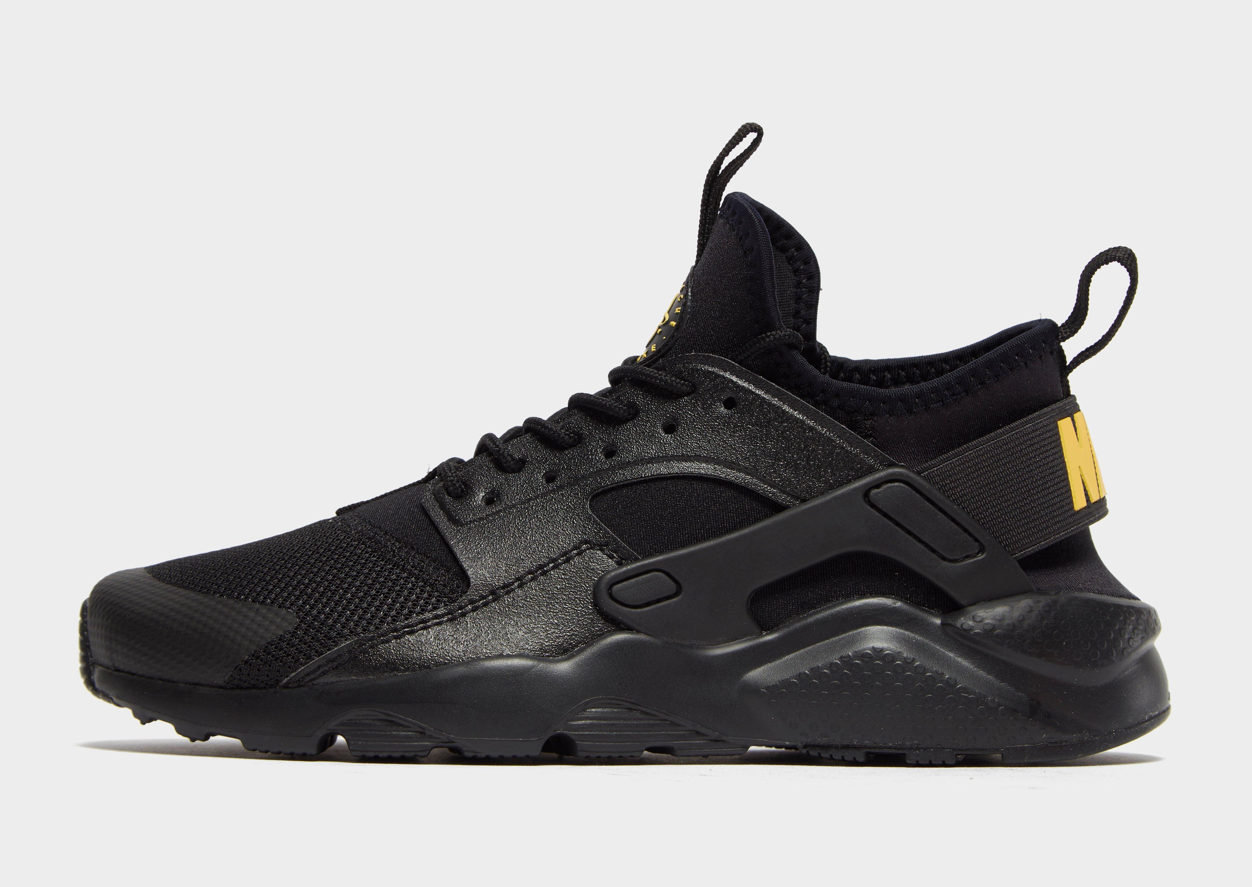 black and yellow nike huaraches