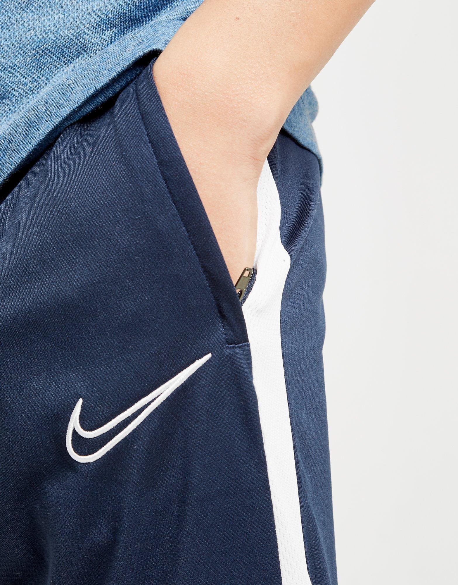 navy nike tracksuit bottoms junior