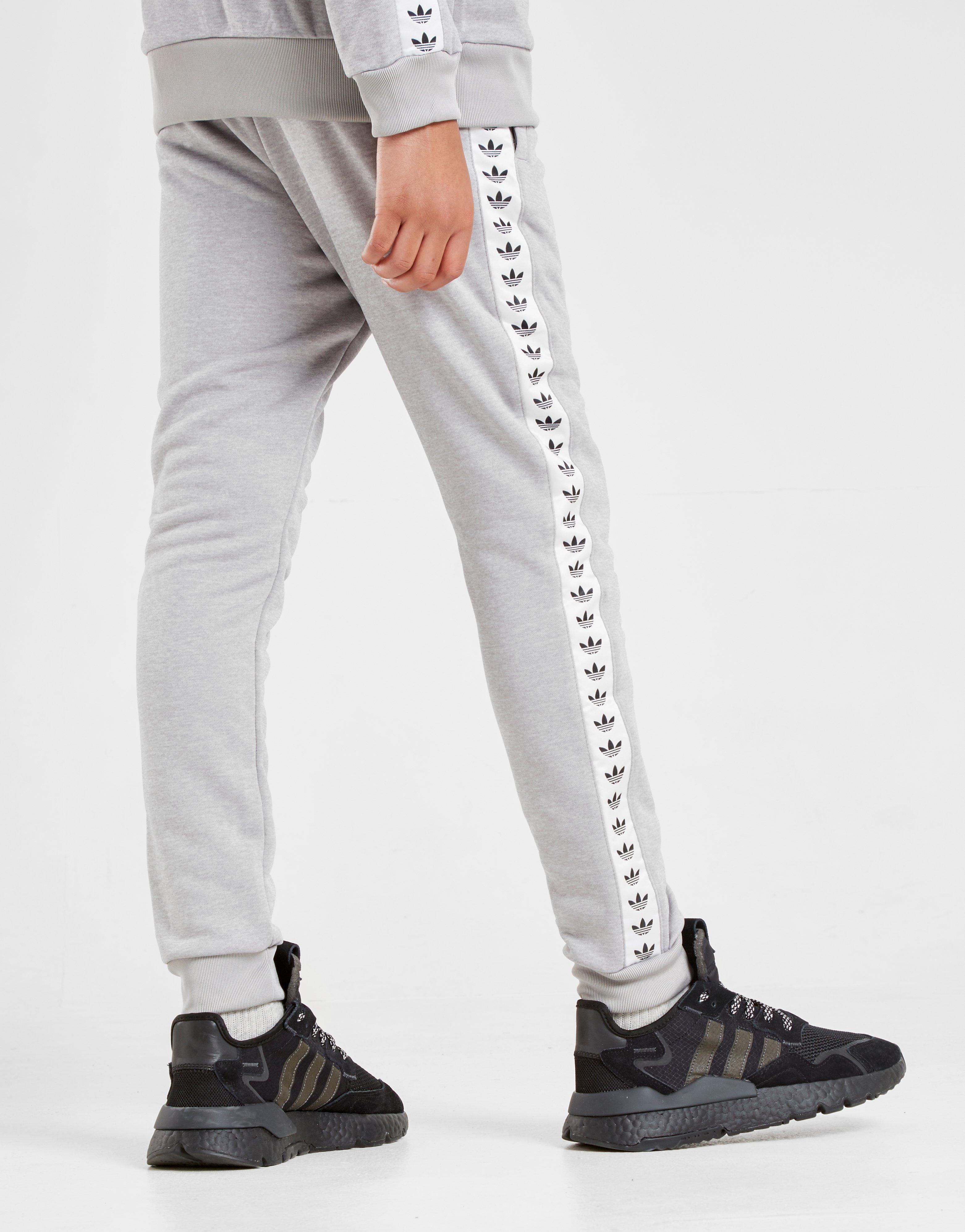 adidas tape poly pants