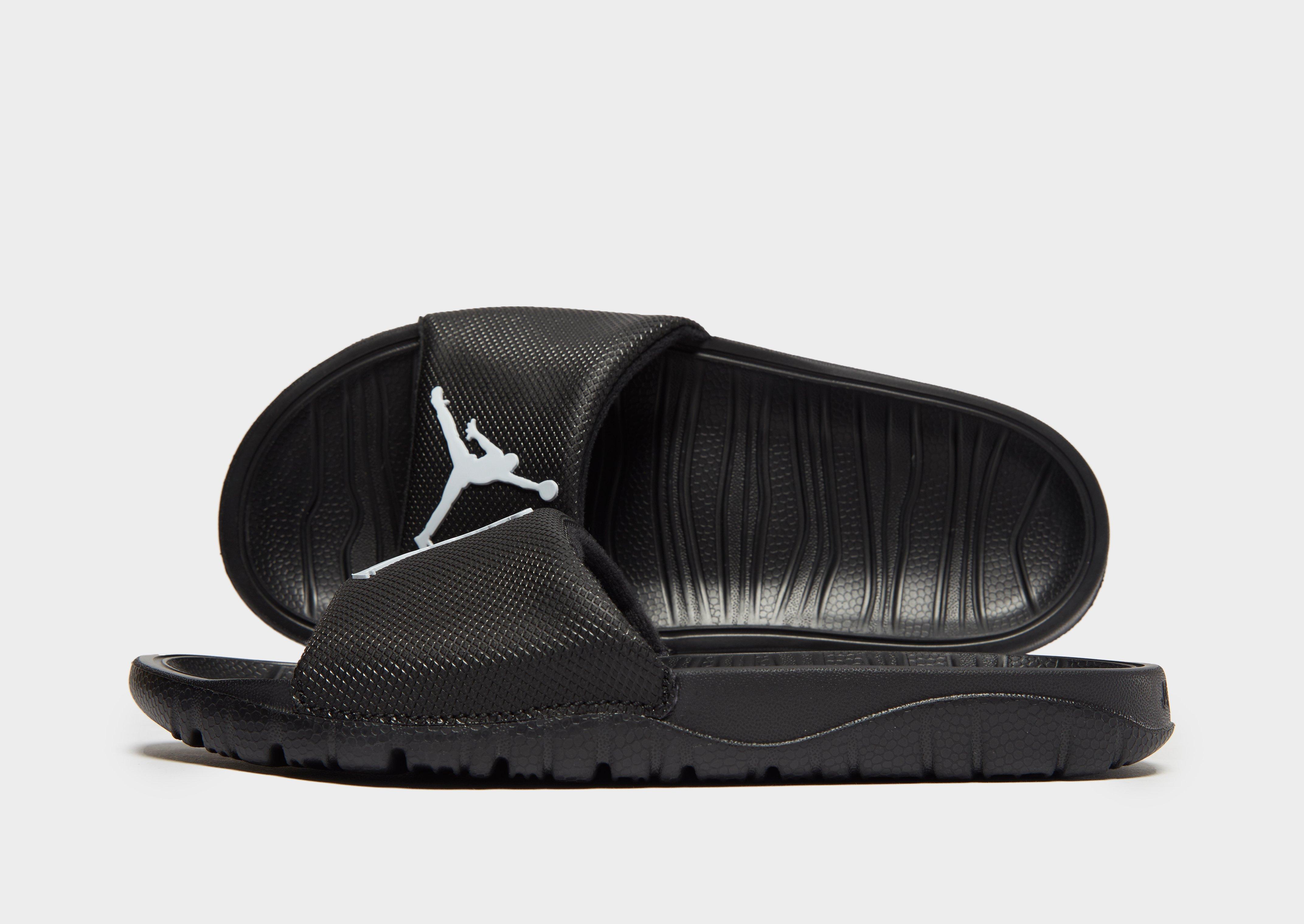 black and white jordan slides