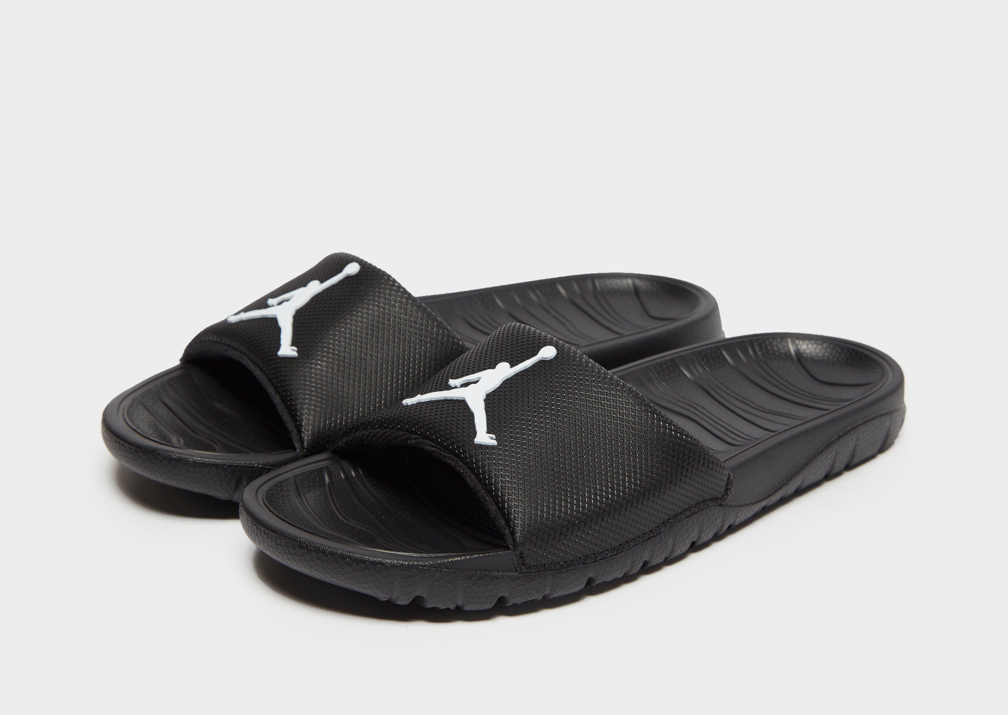 all black jordan sandals