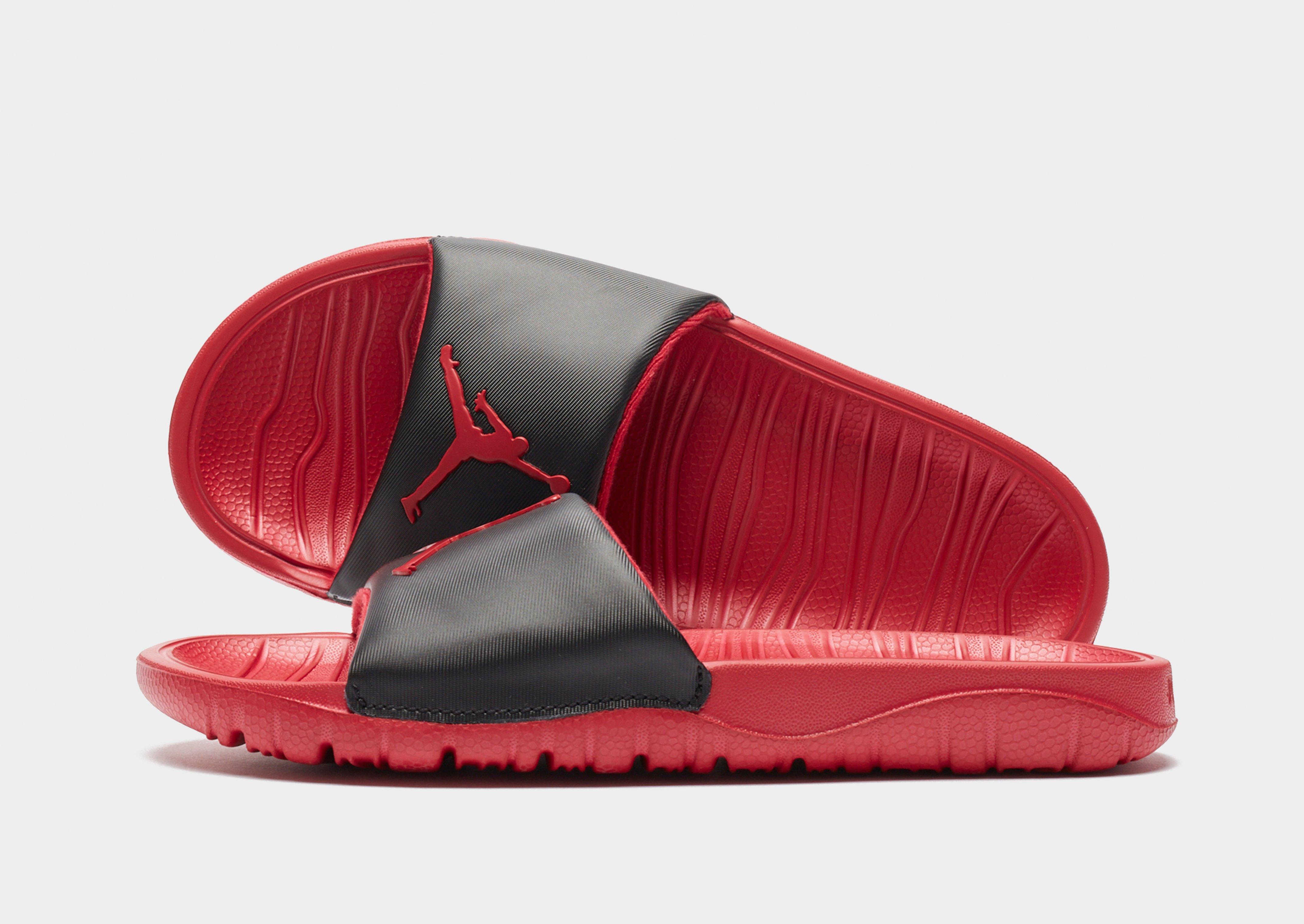 all red jordan slides