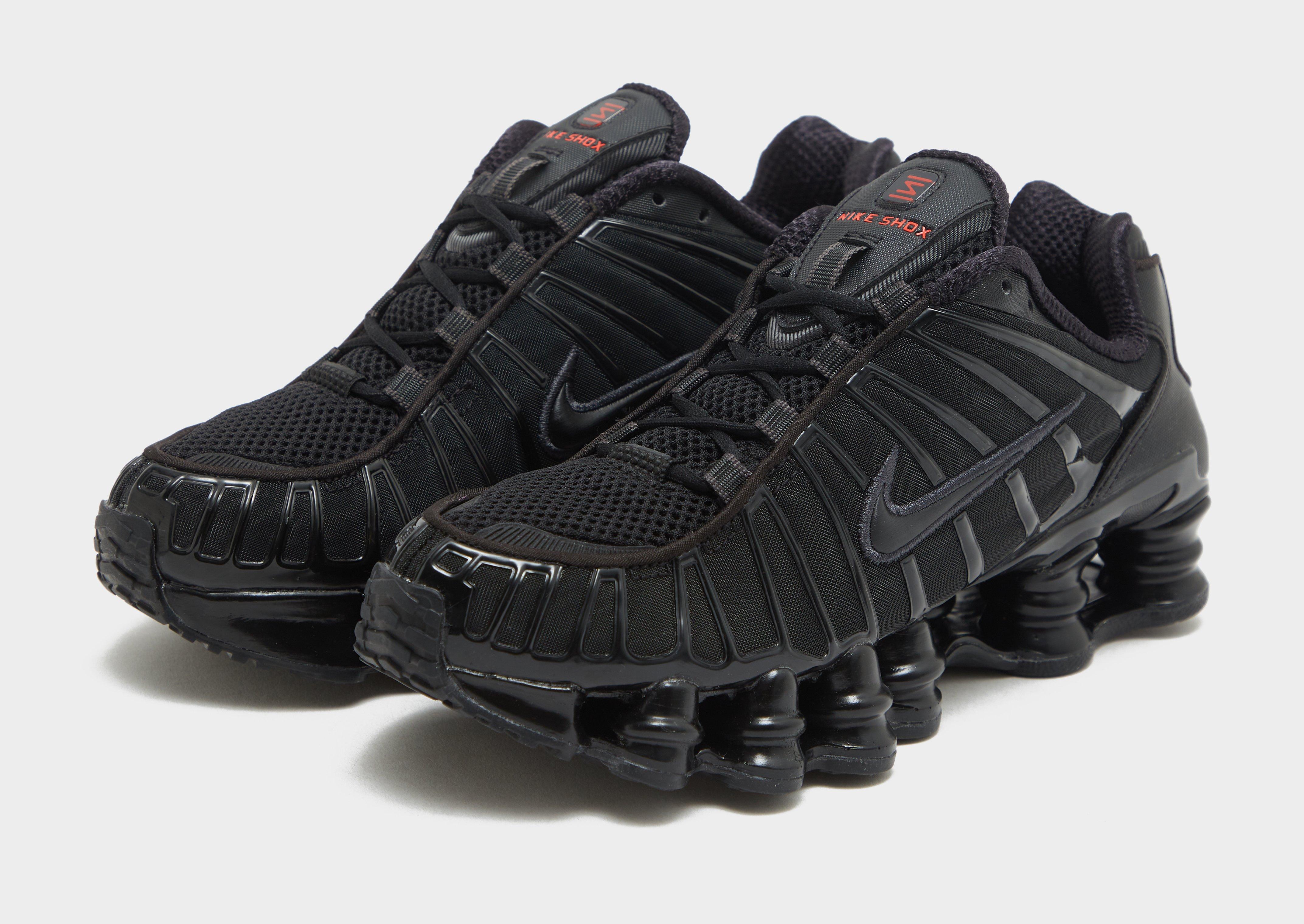 All black best sale nike shocks