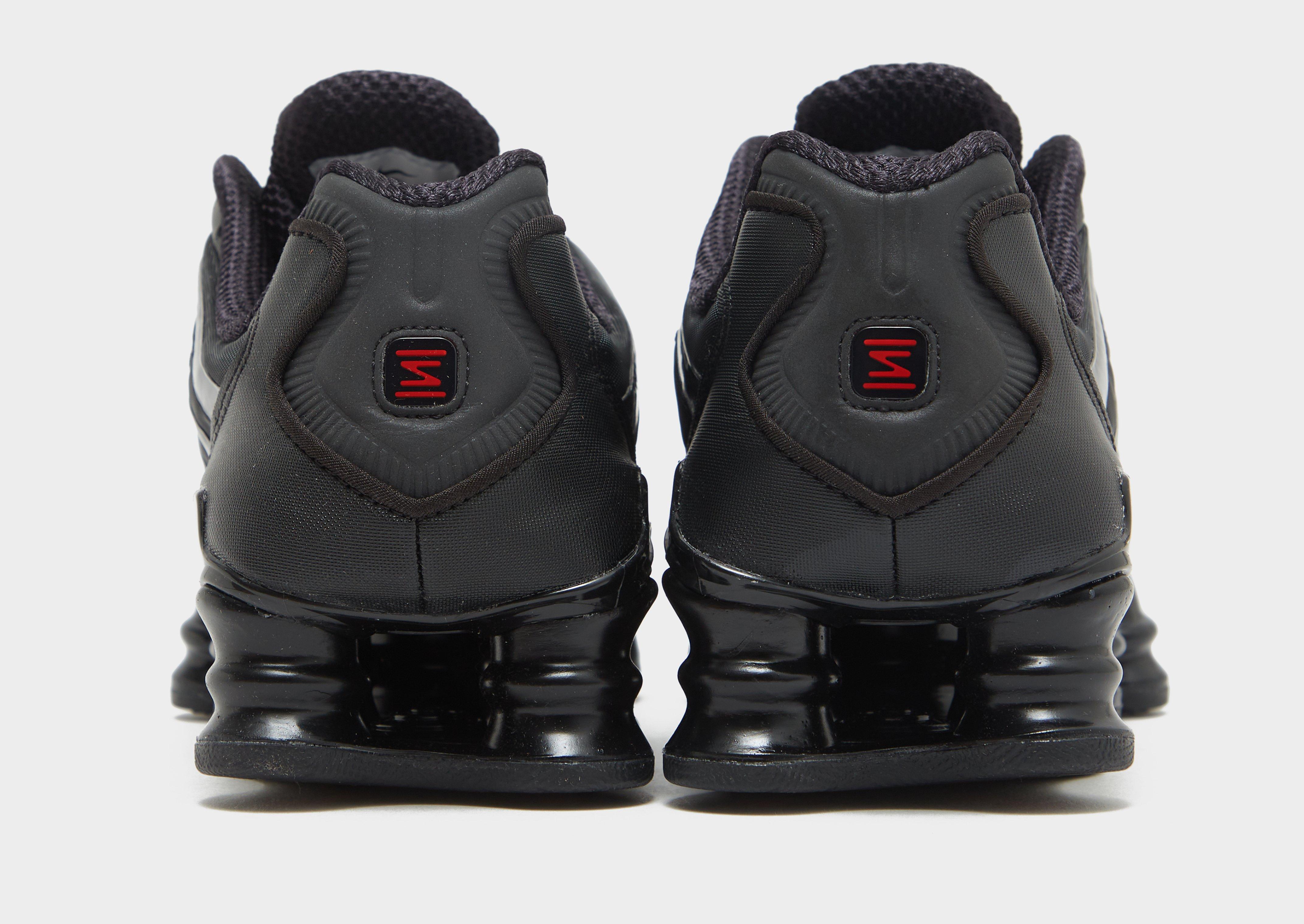 Boys black nike shox online