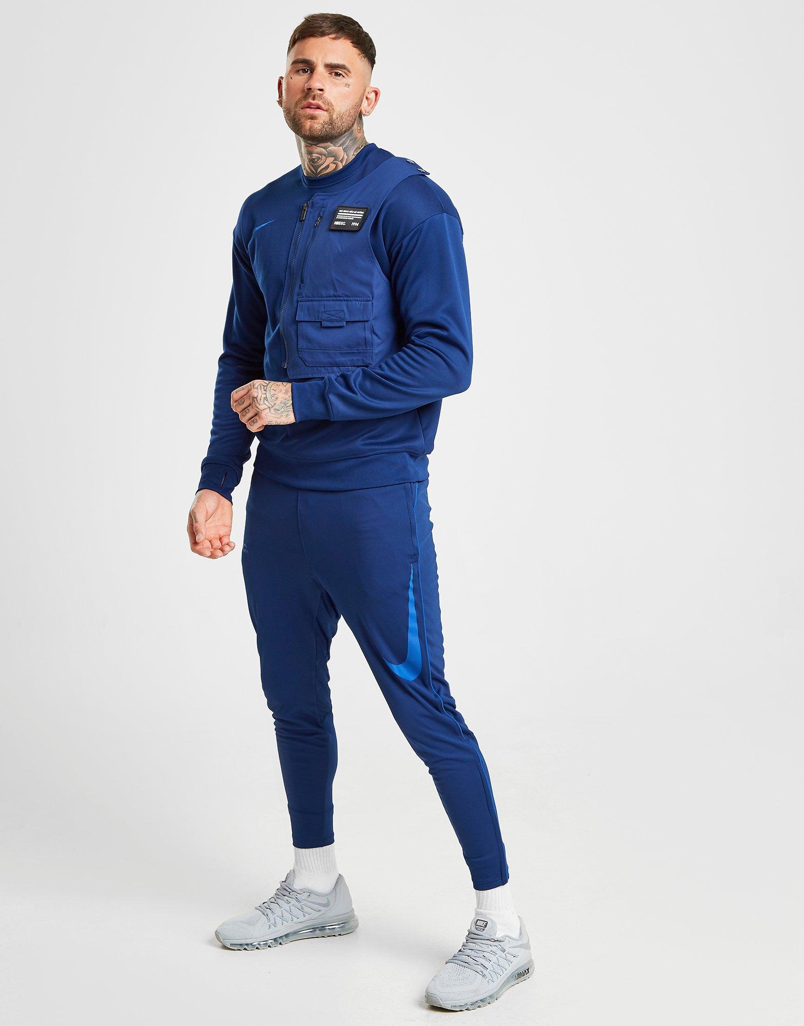 nike poly track pants
