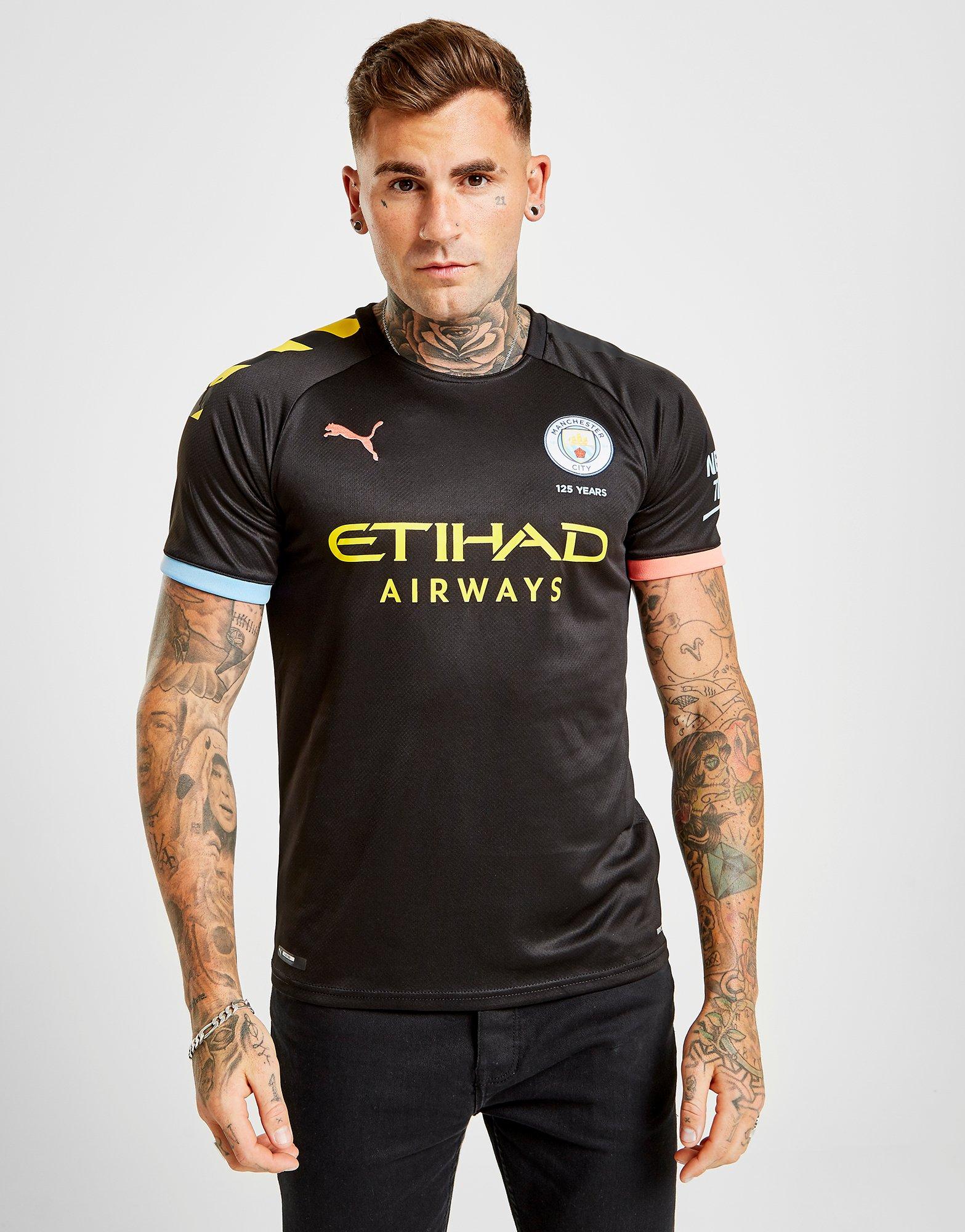 man city black away shirt