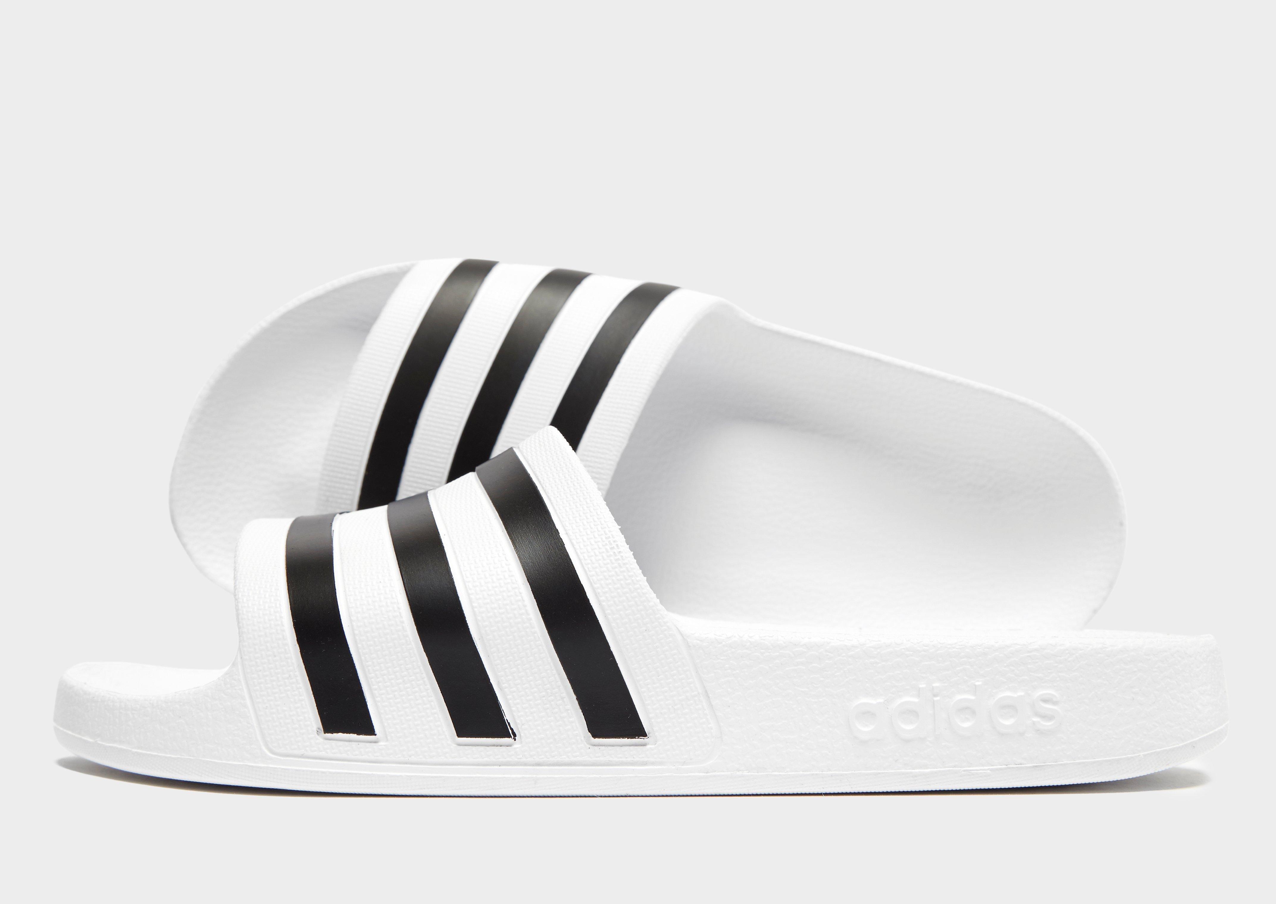 white adidas slides