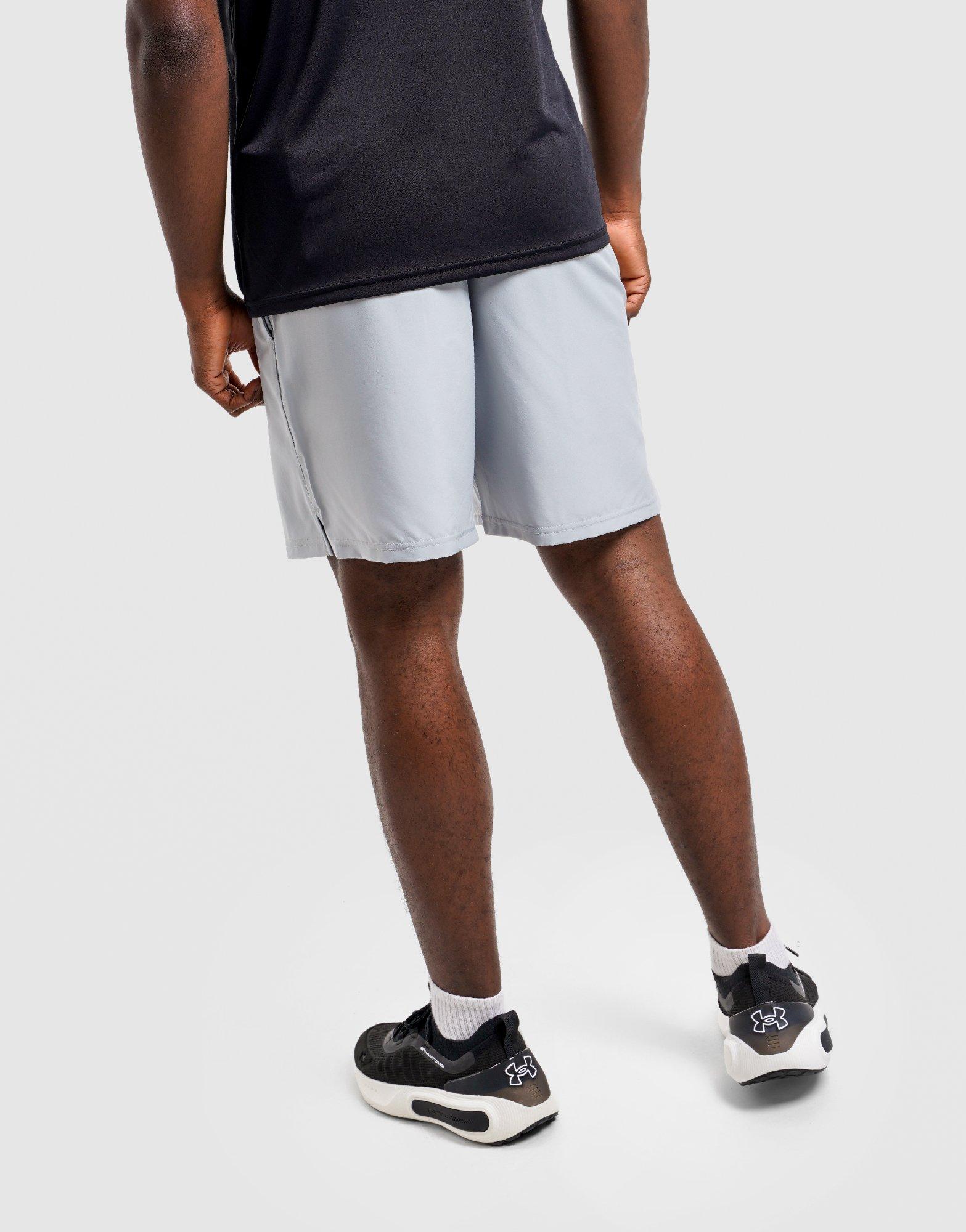 Under Armour Short 21 cm tissé avec logo Tech