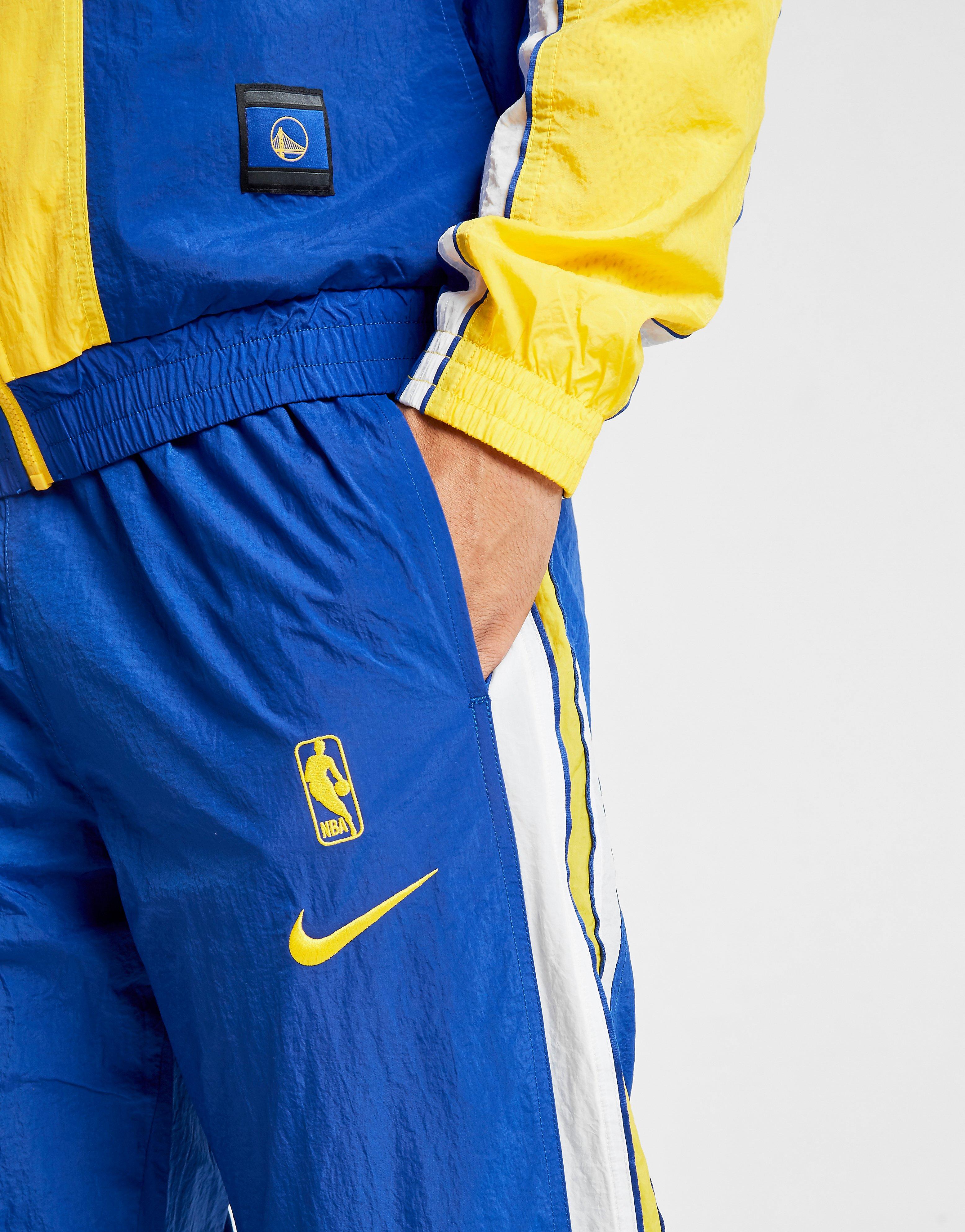 yellow and blue nike tracksuit