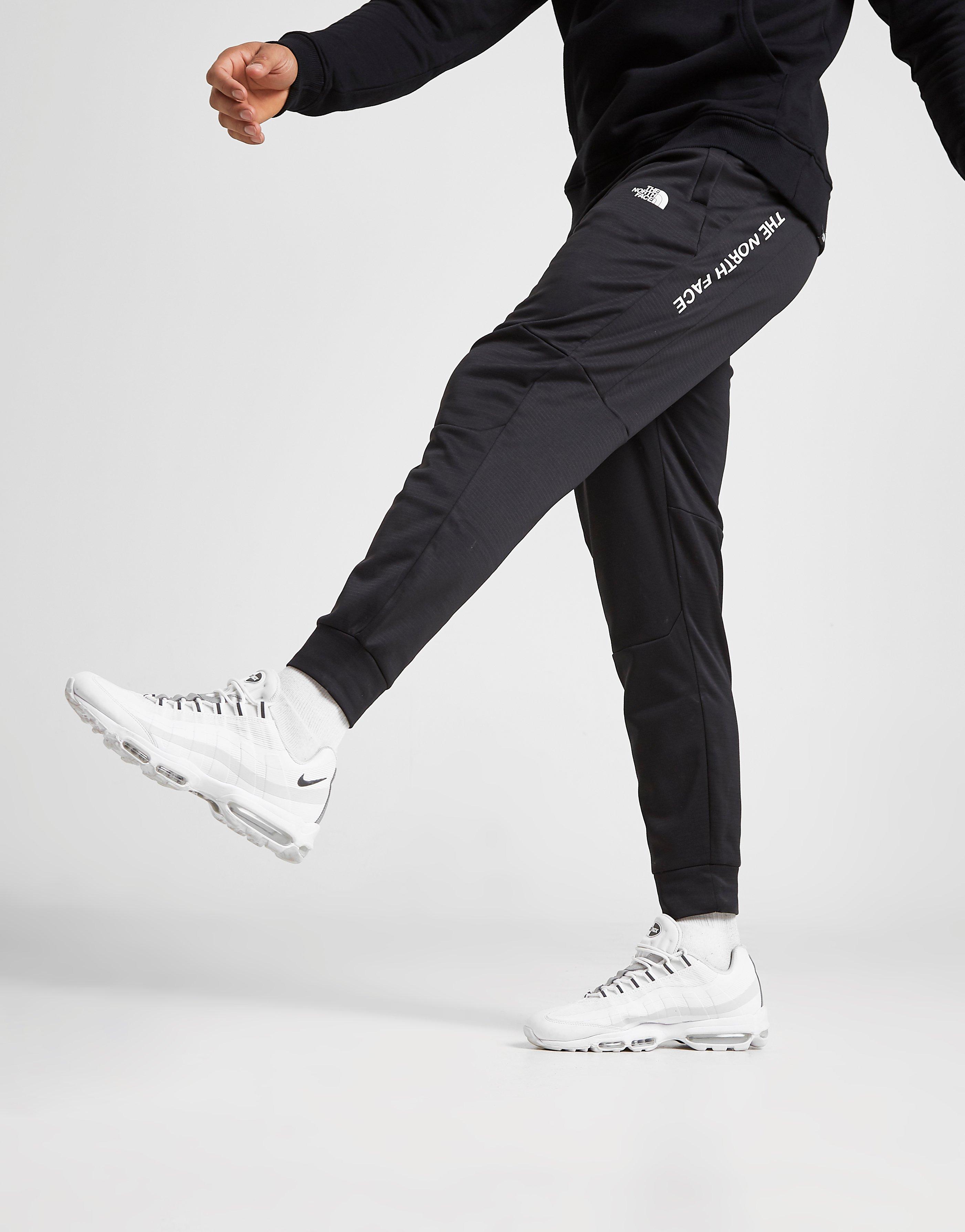 north face train n logo track pants