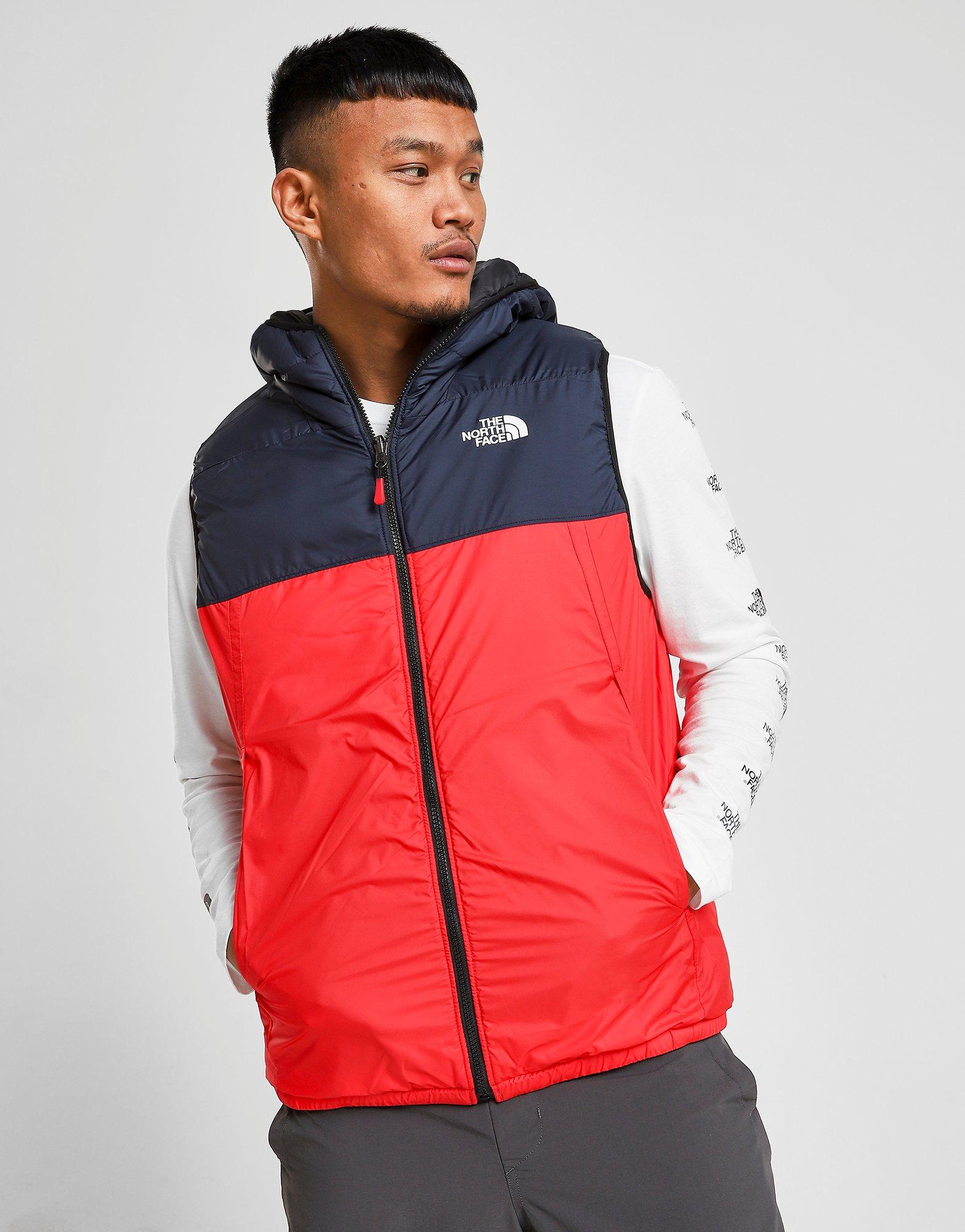 red and black north face gilet