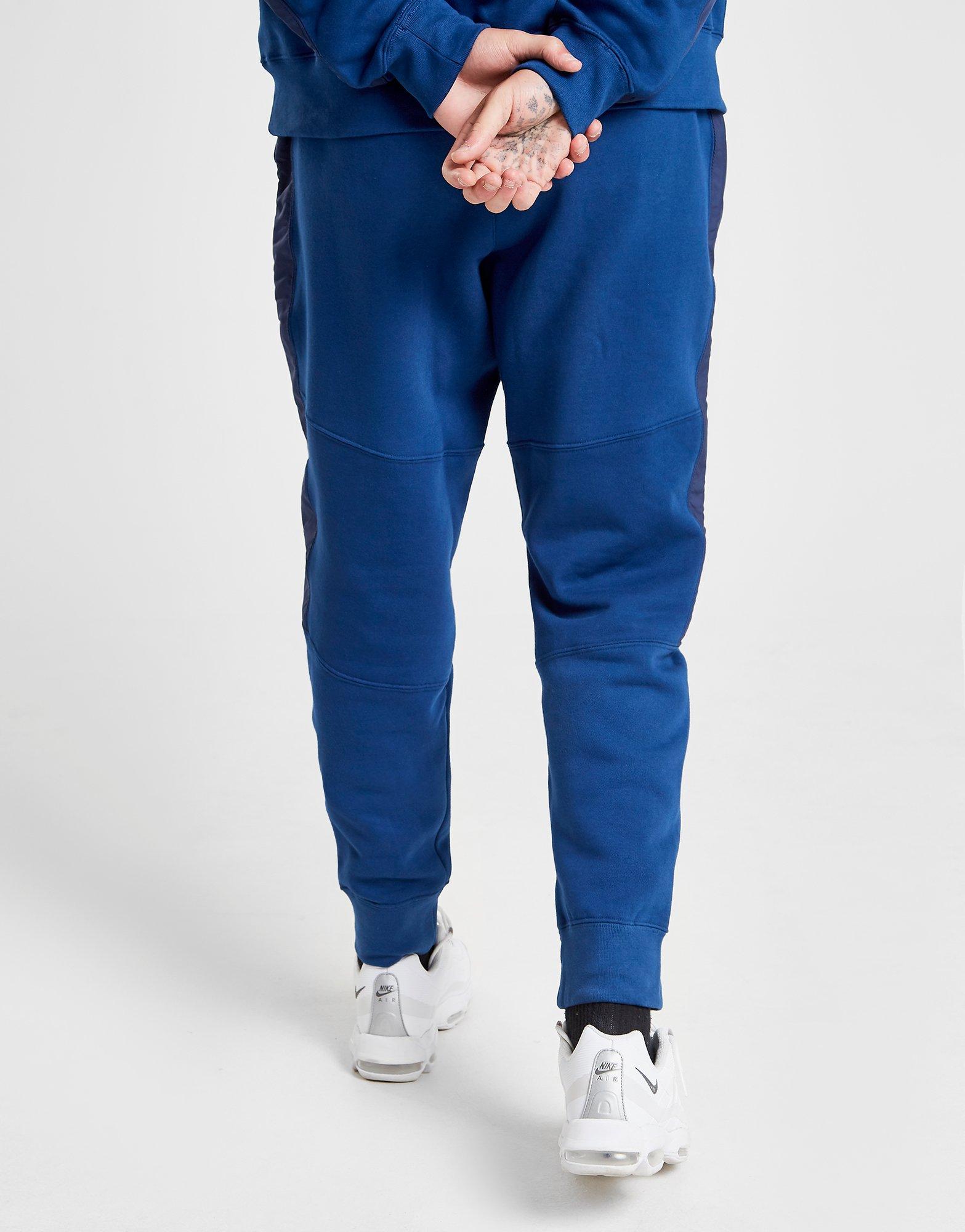 nike hybrid track pants blue