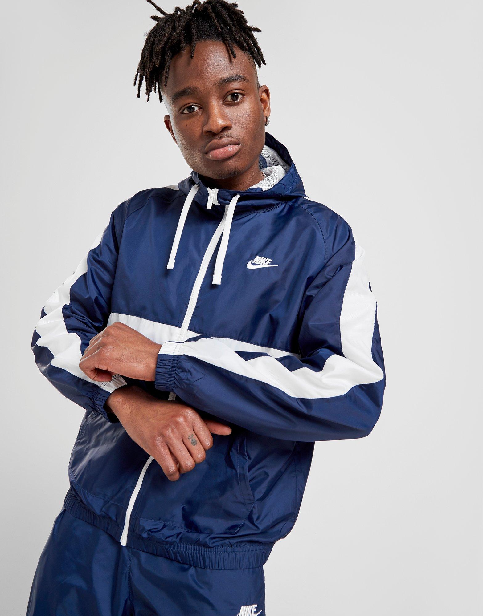 nike woven tracksuit blue