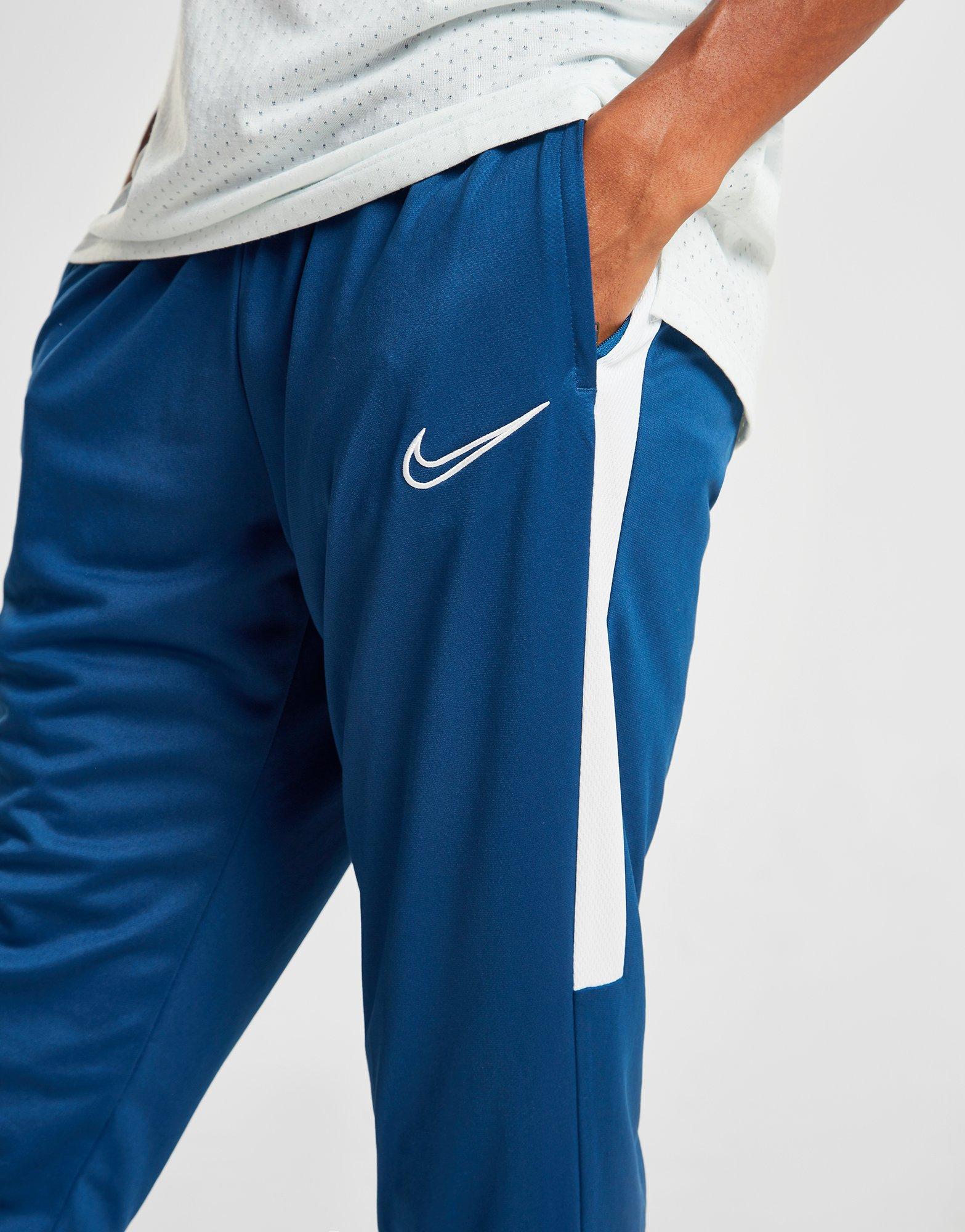 nike academy track pants blue