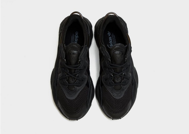 all black adidas ozweego junior