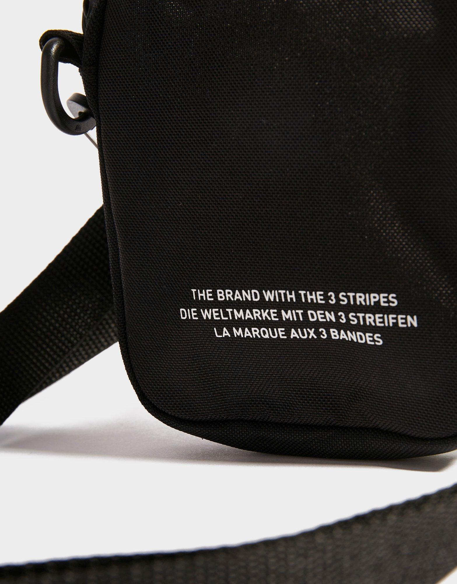 the brand with the 3 stripes bag