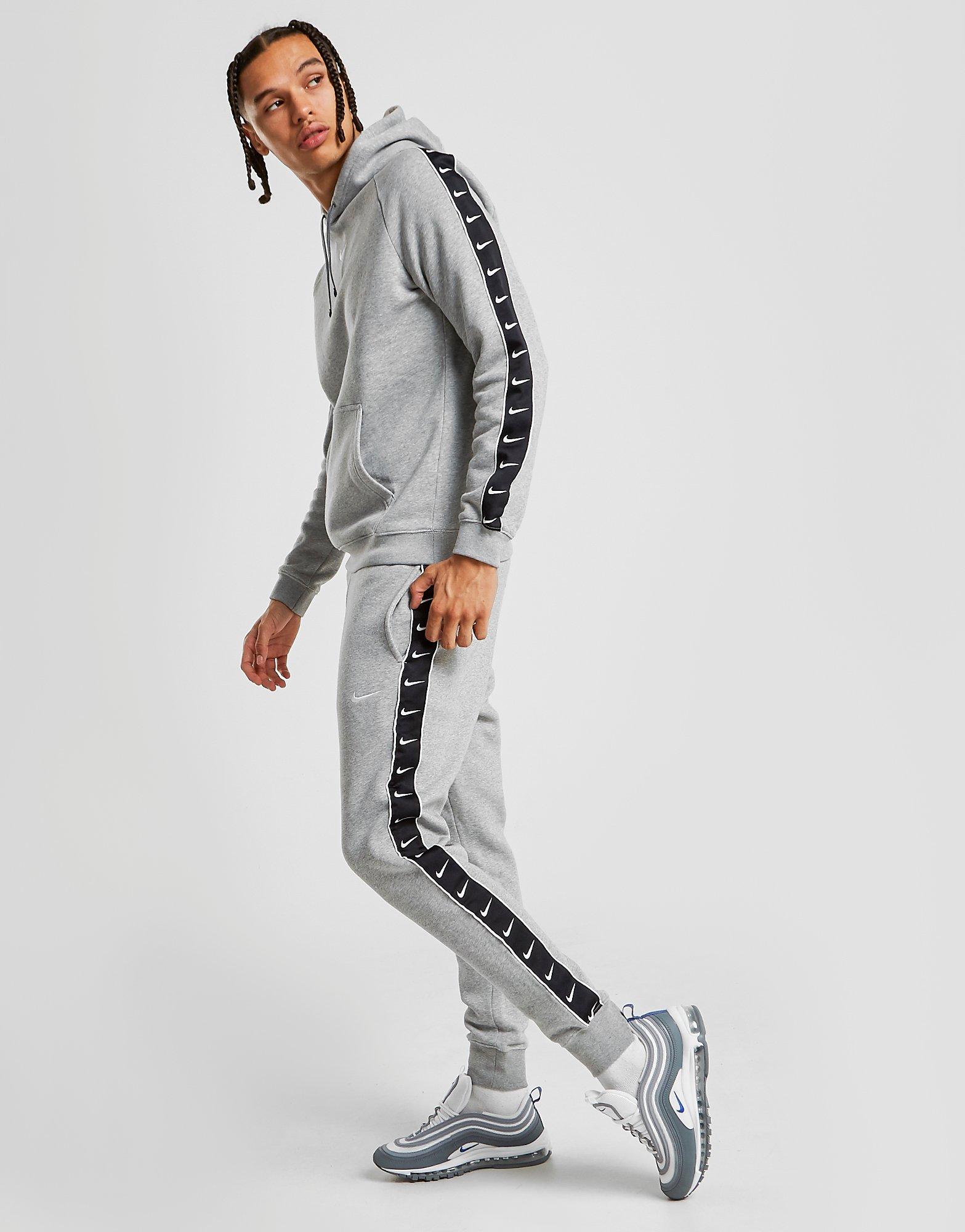 grey nike tape joggers