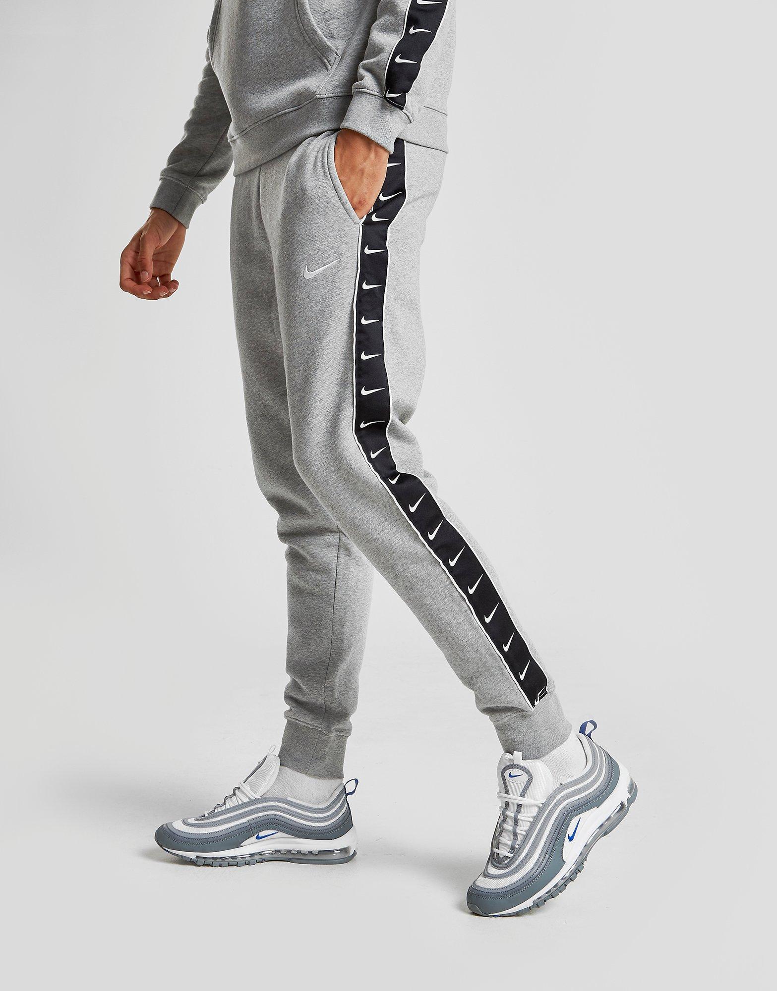 nike tracksuit with ticks down the side