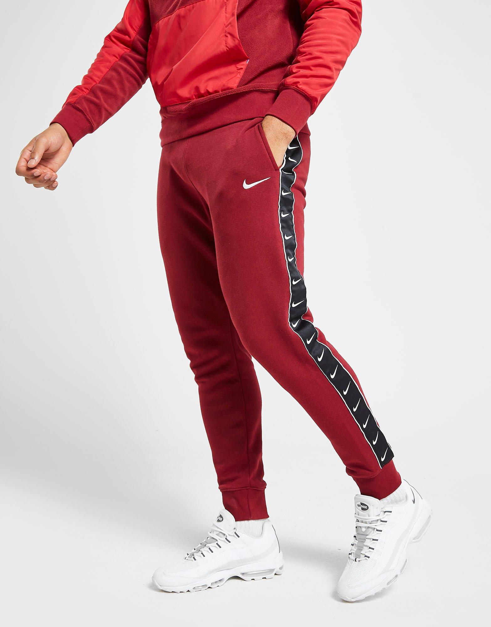 champion black & red taping track pants