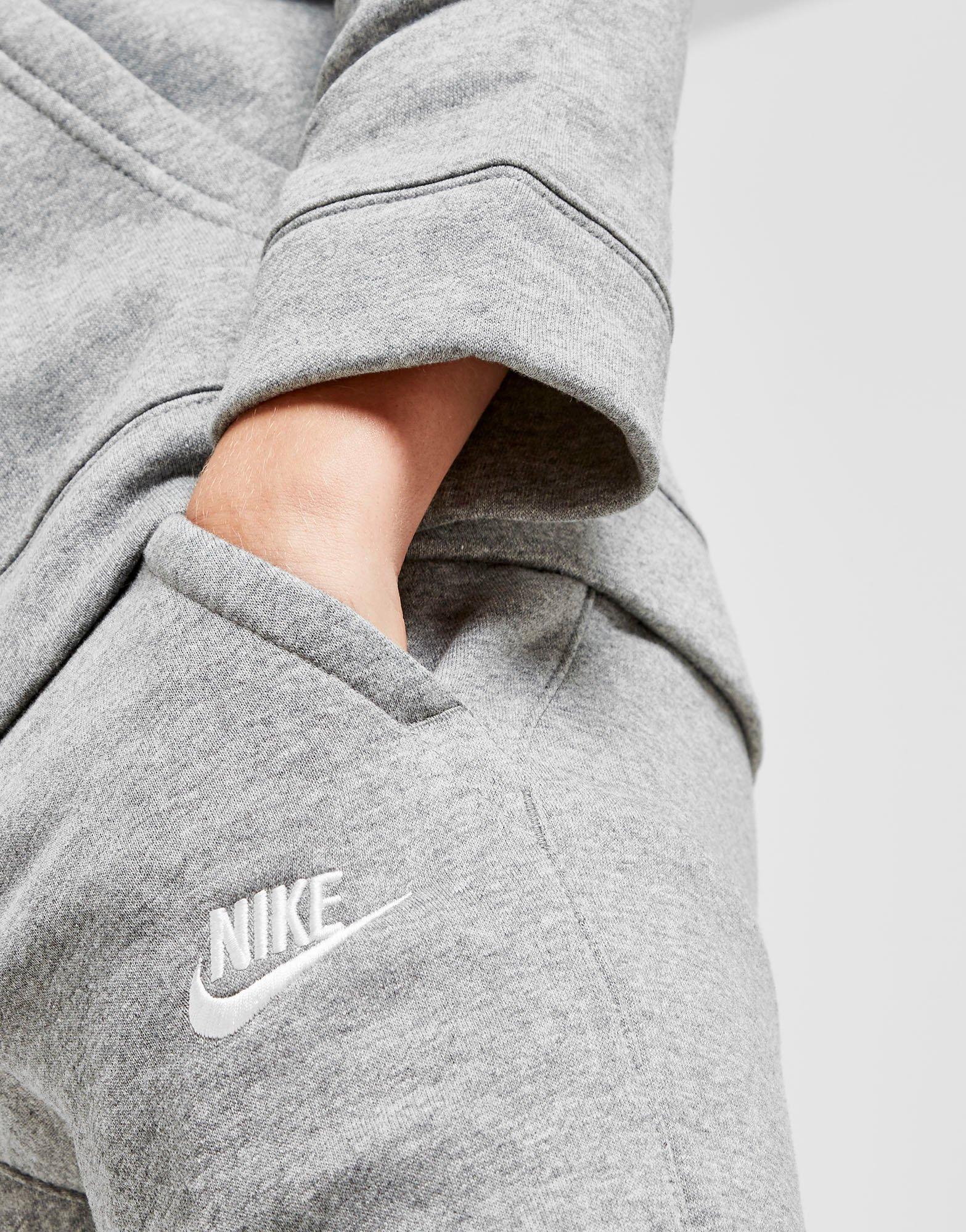 grey nike tracksuit junior