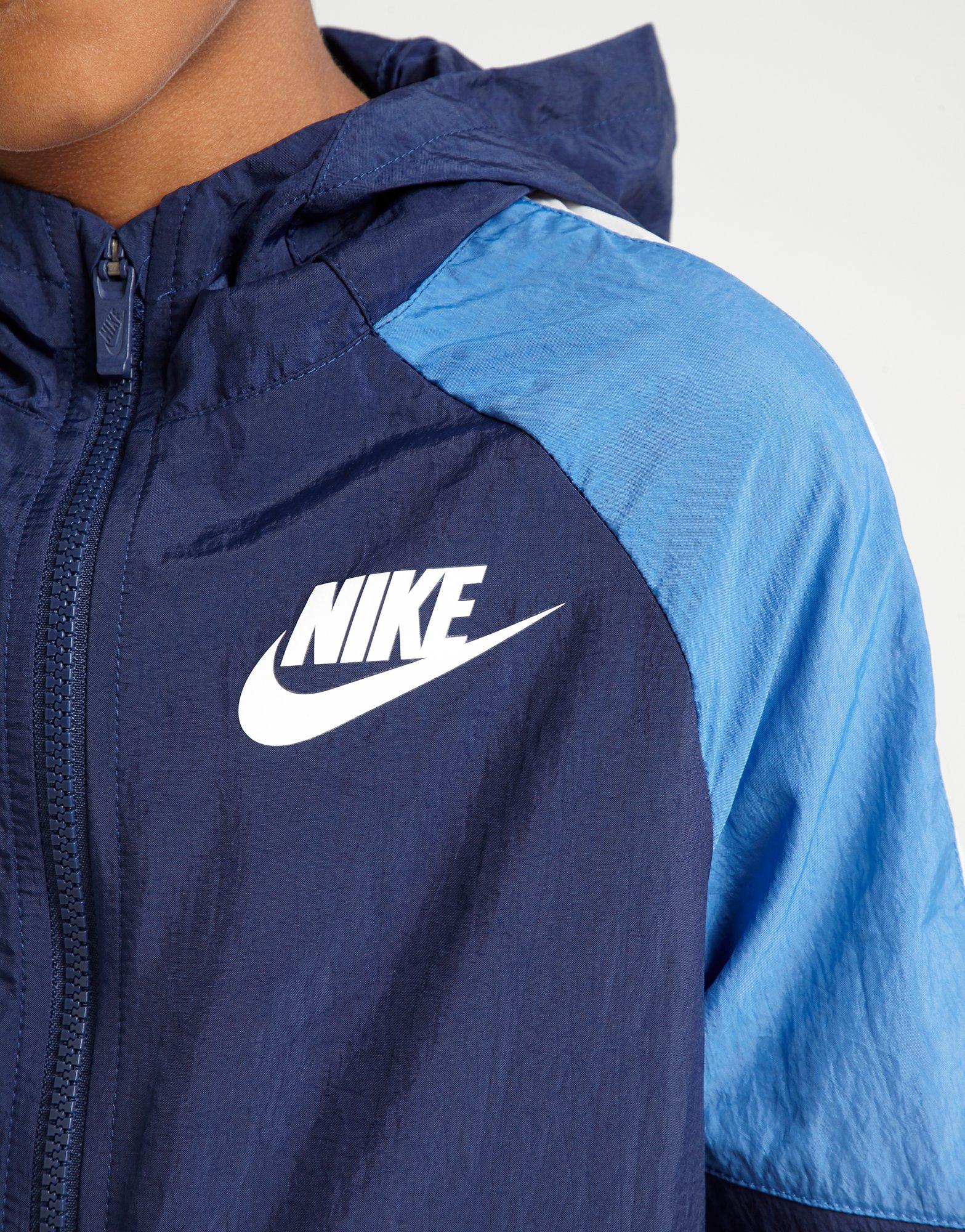 blue nike tracksuit junior
