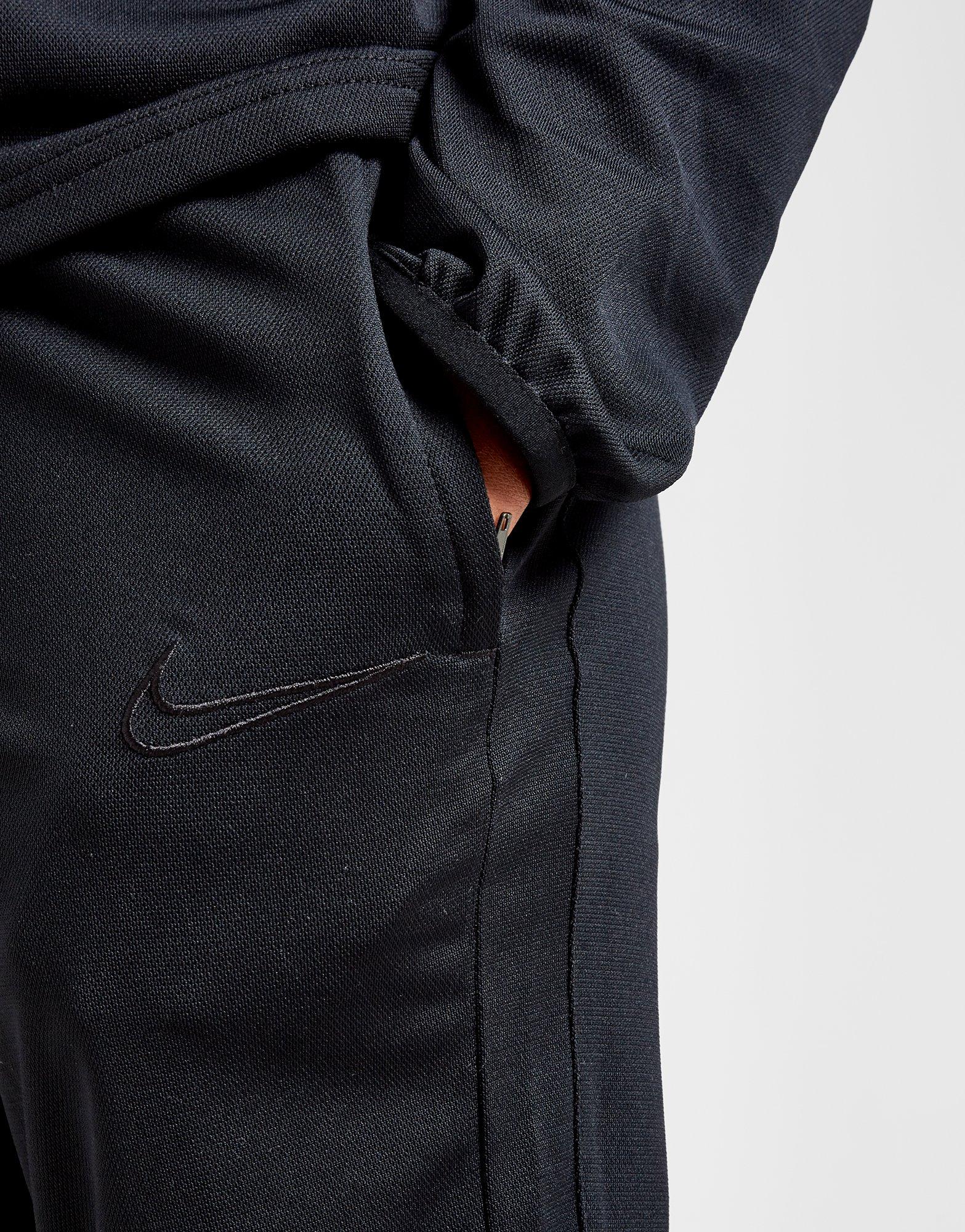 black nike tracksuit junior