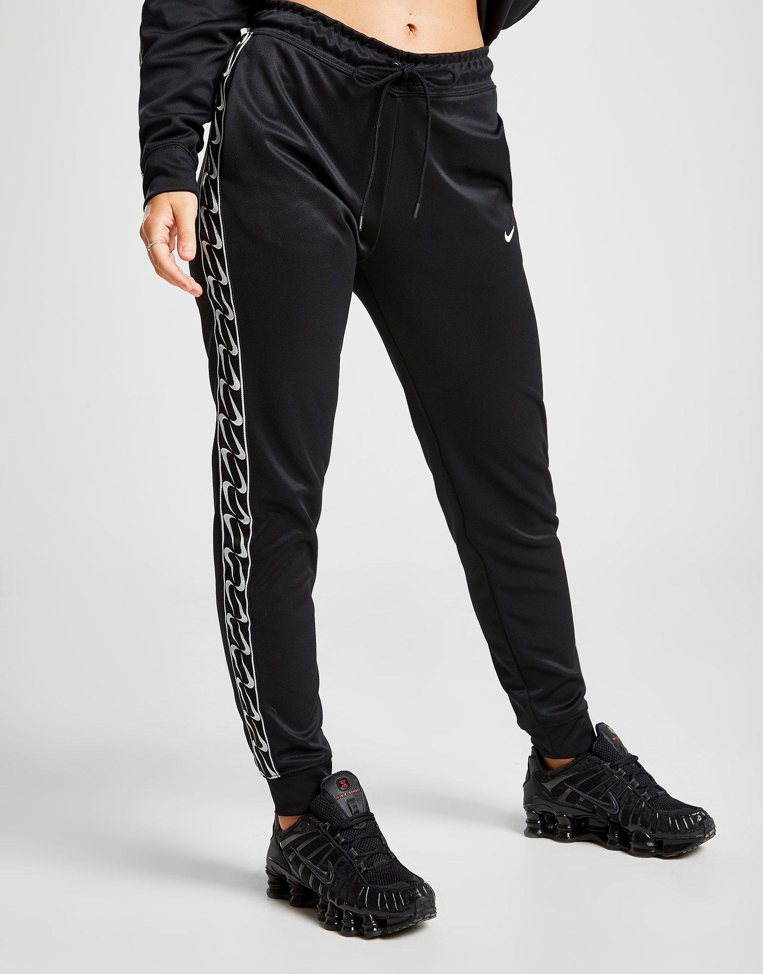 nike tape track pants womens