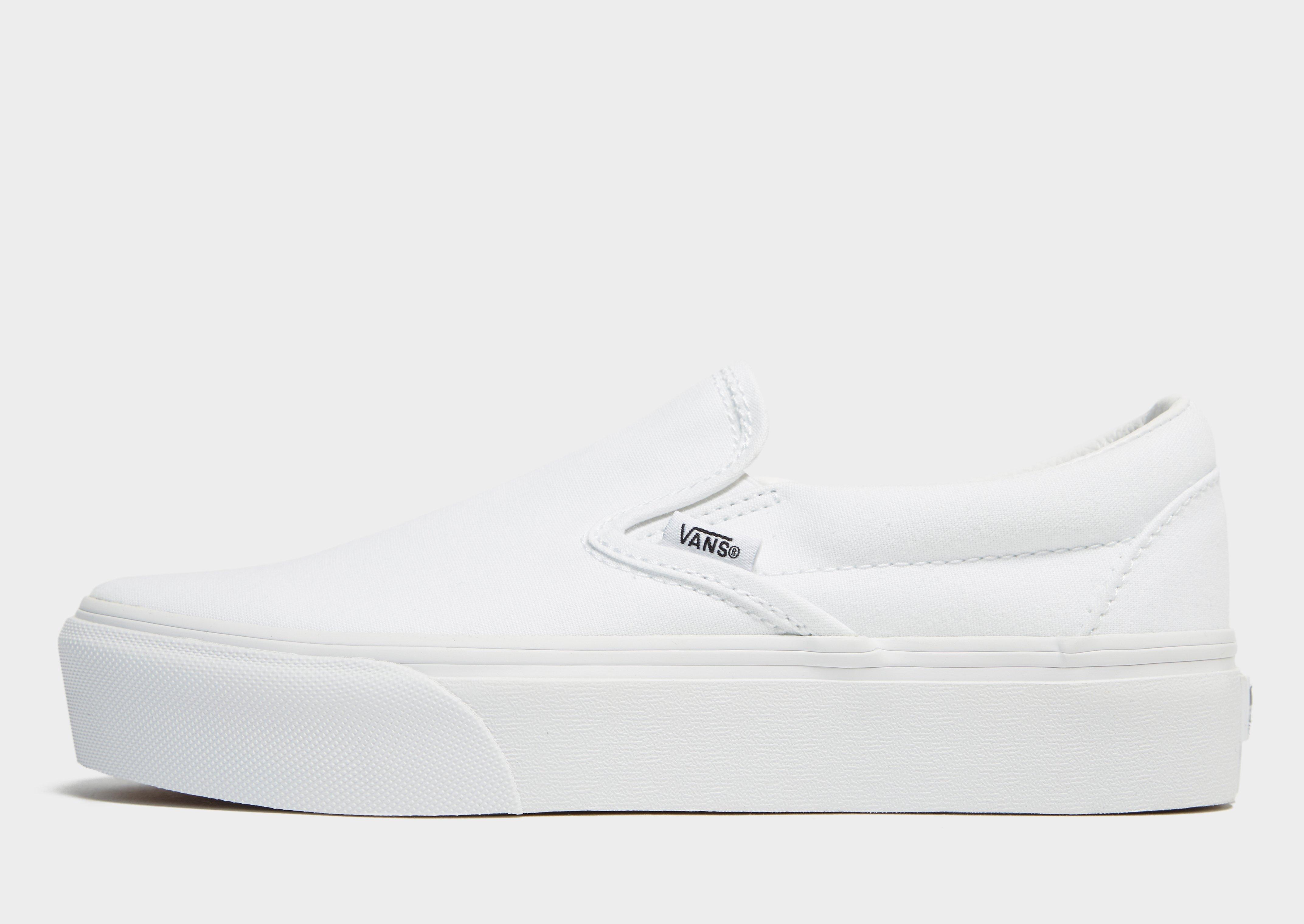 vans white slip ons platform
