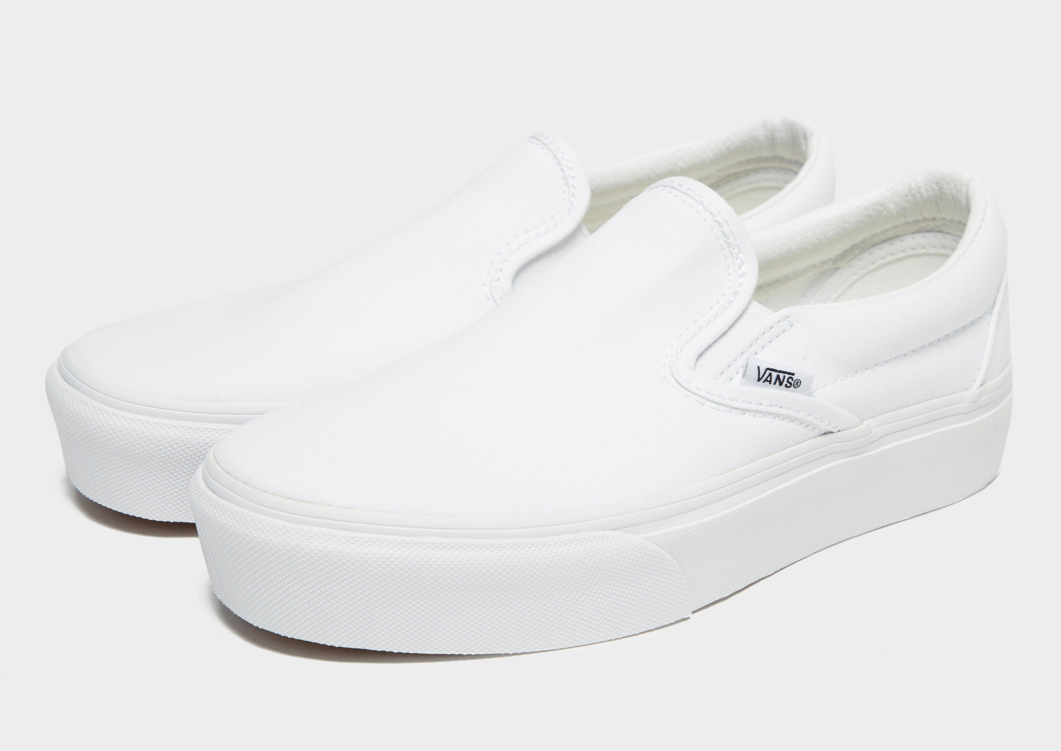 vans white platform slip on