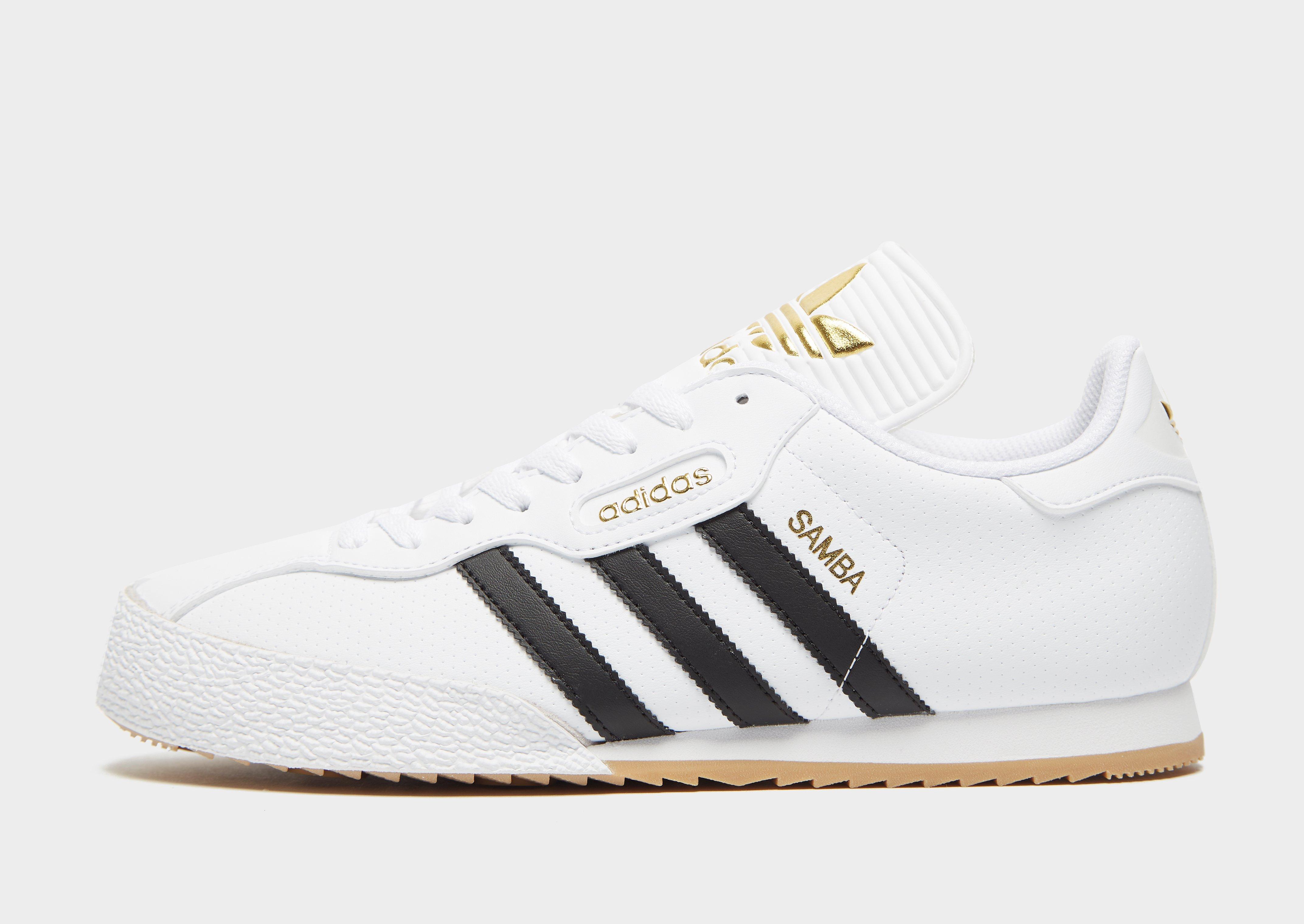 white samba trainers