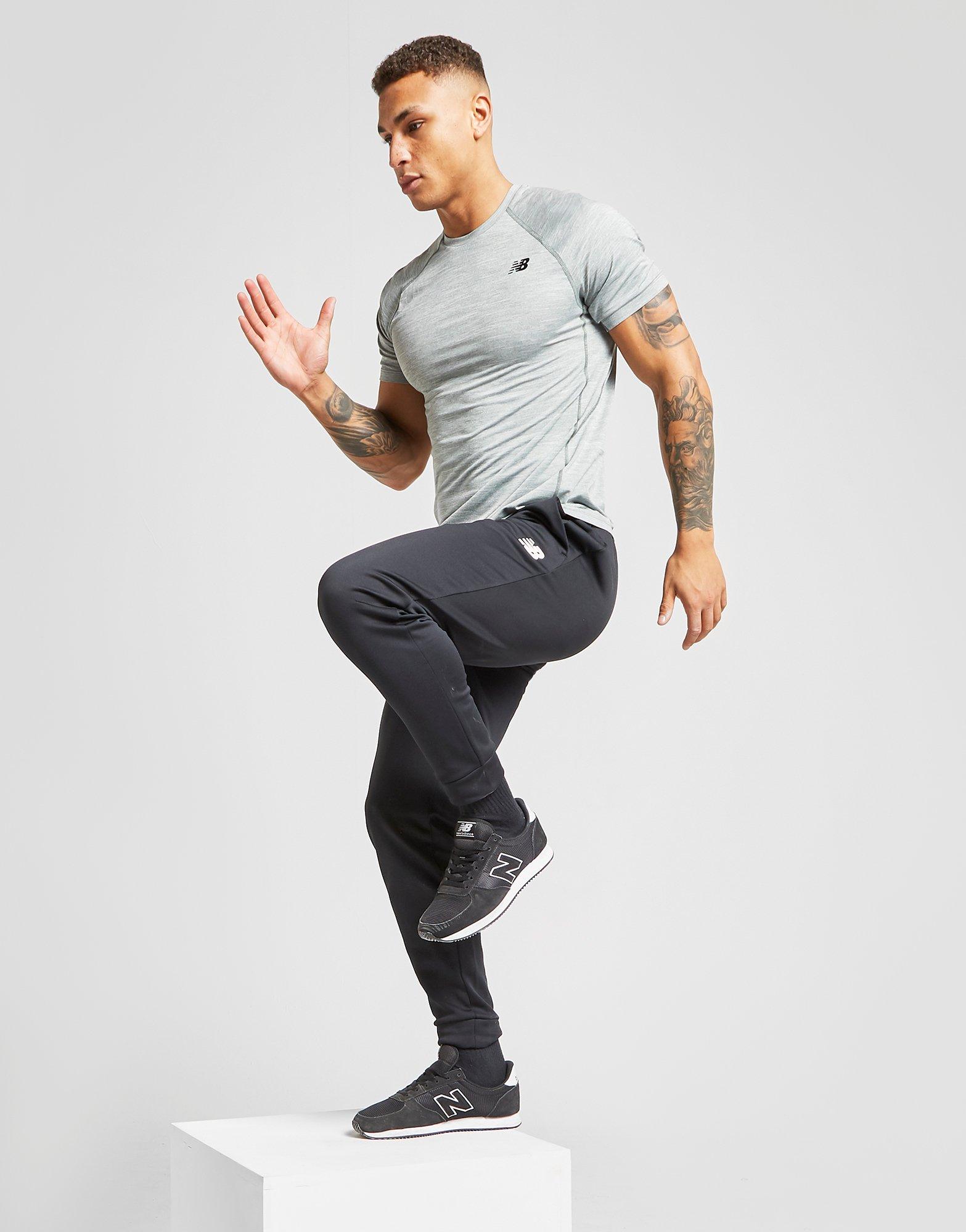 new balance running tenacity tapered joggers in black