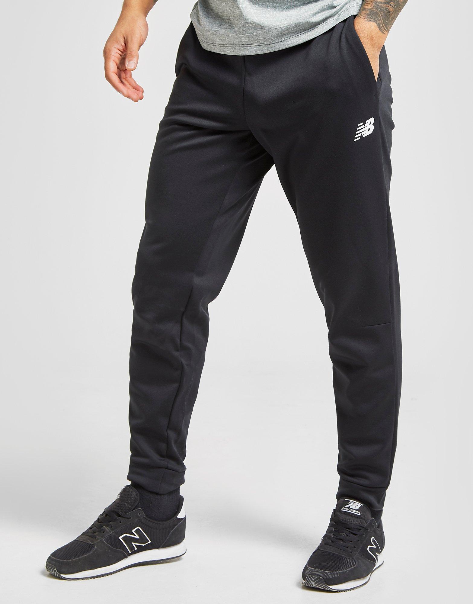 new balance tenacity poly track pants