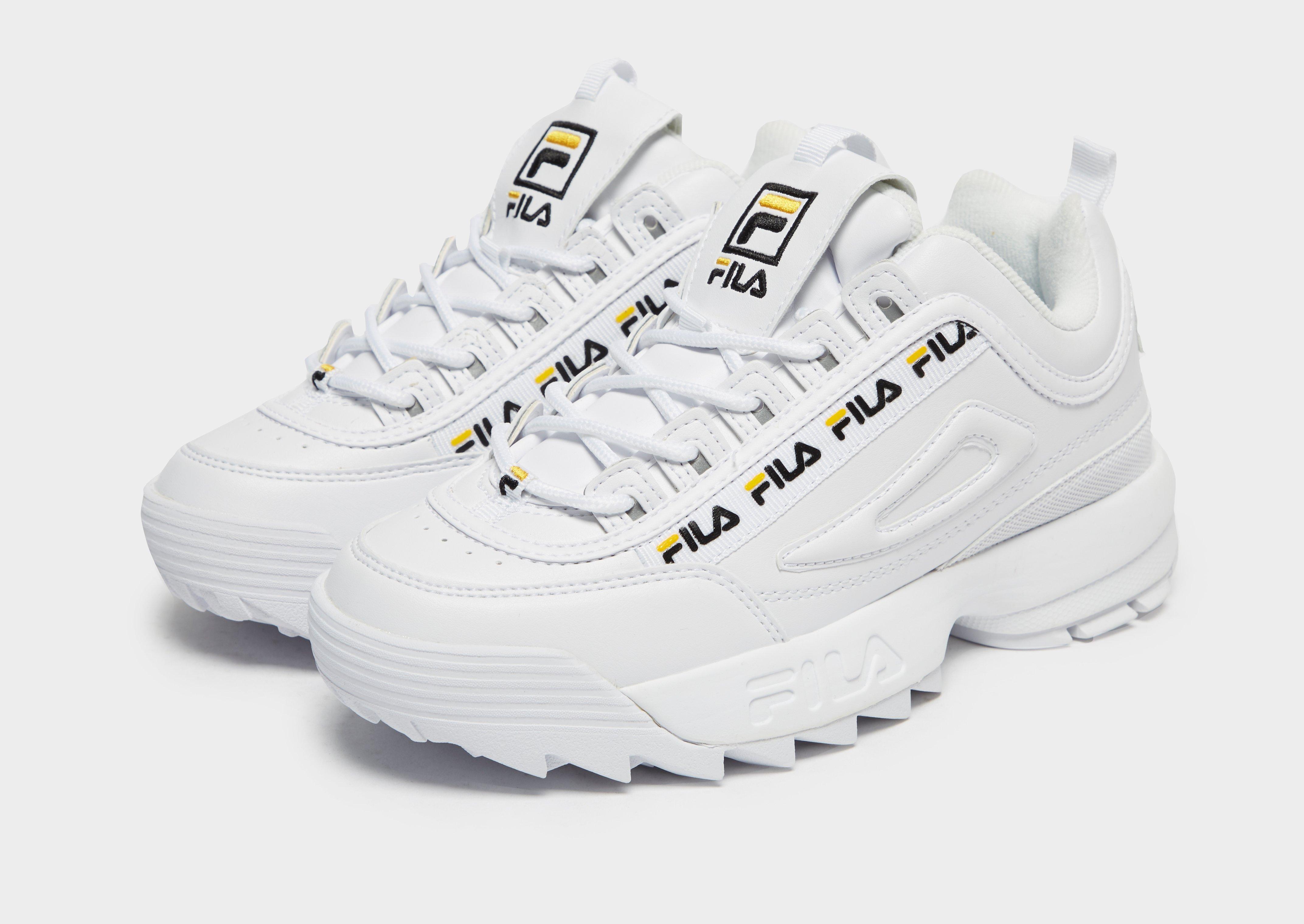 yellow and white fila disruptor