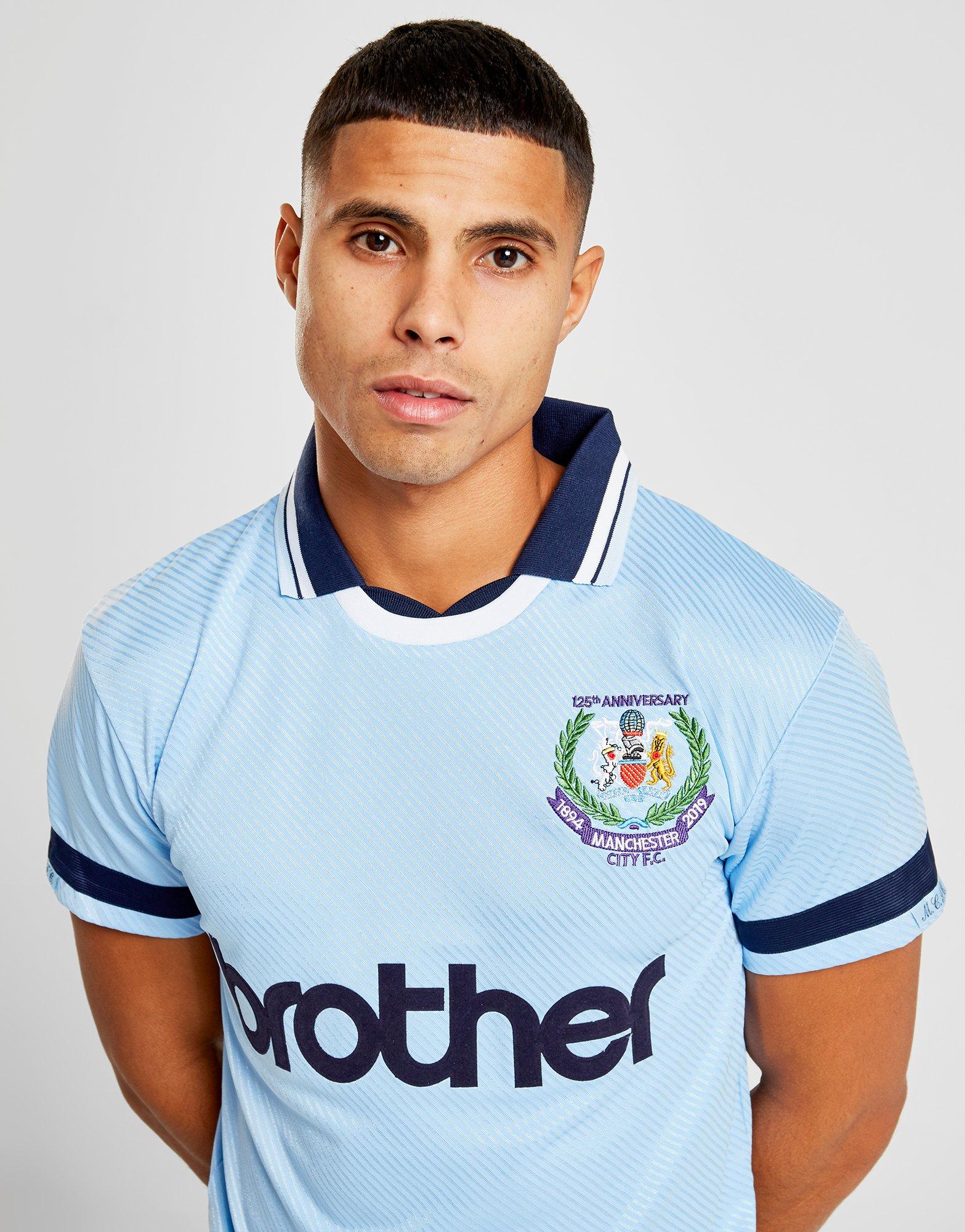 man city centenary shirt