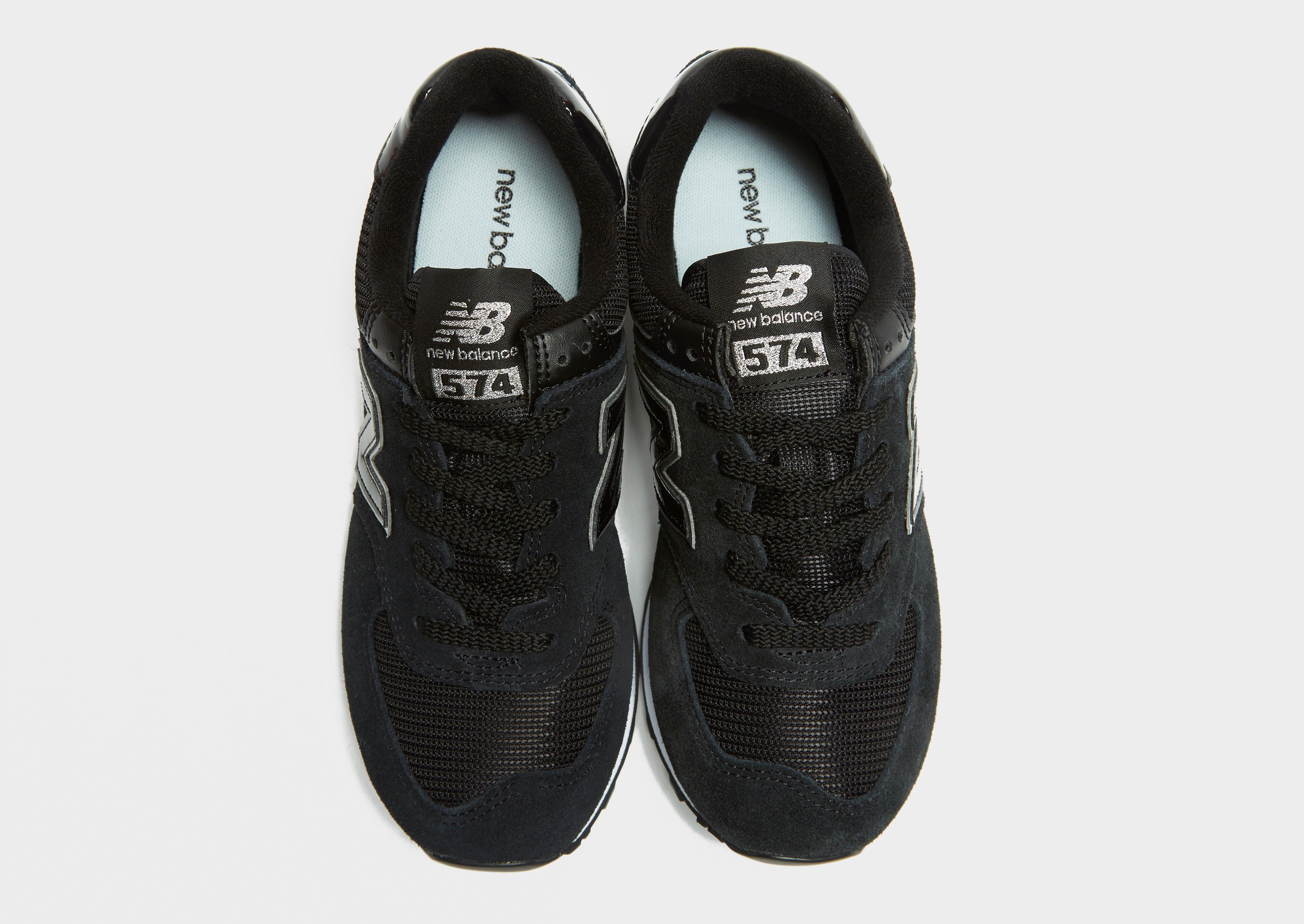 new balance 574 black leather