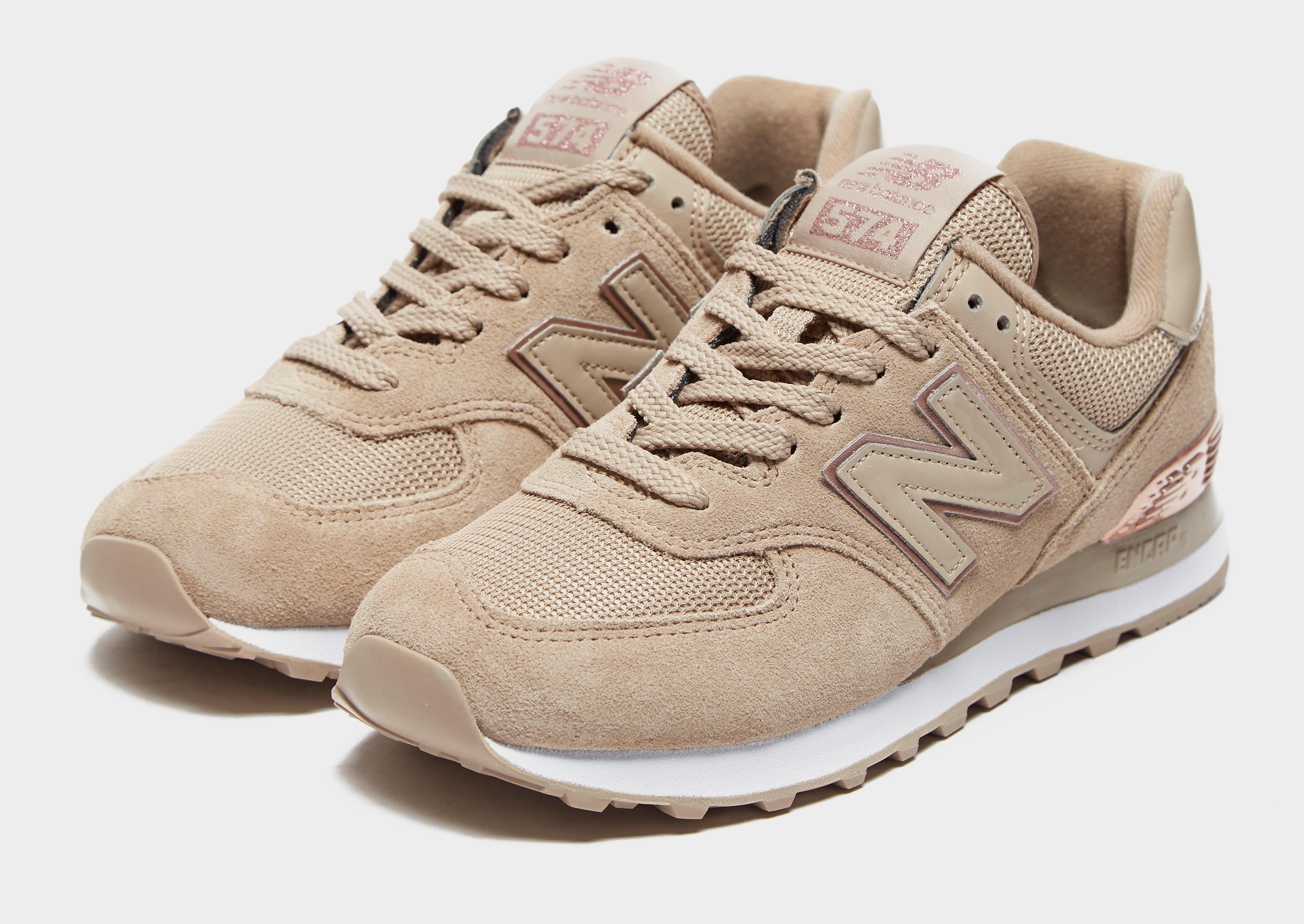 Compra New Balance 574 para mujer en Marrón