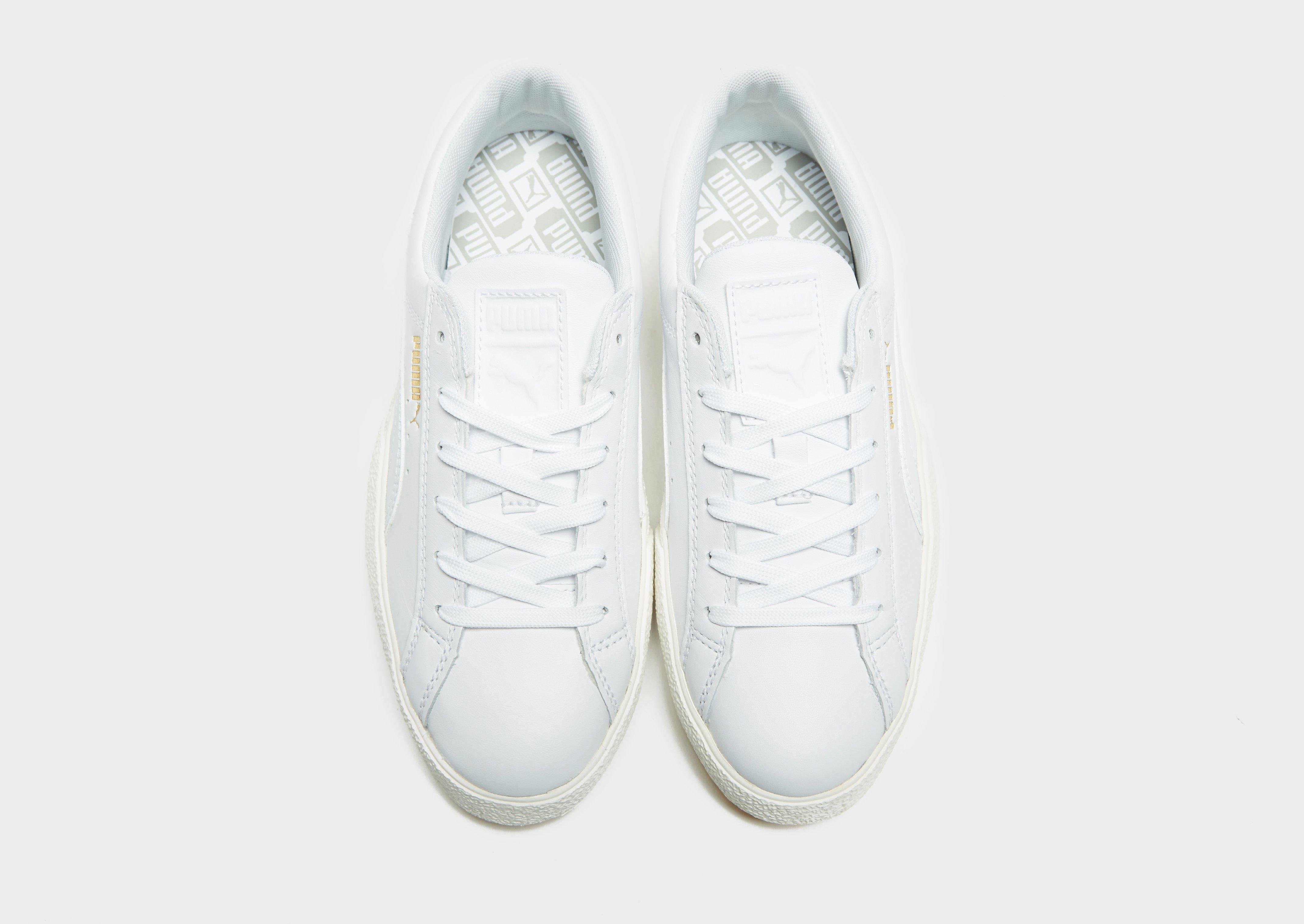 tuta puma bianca e oro